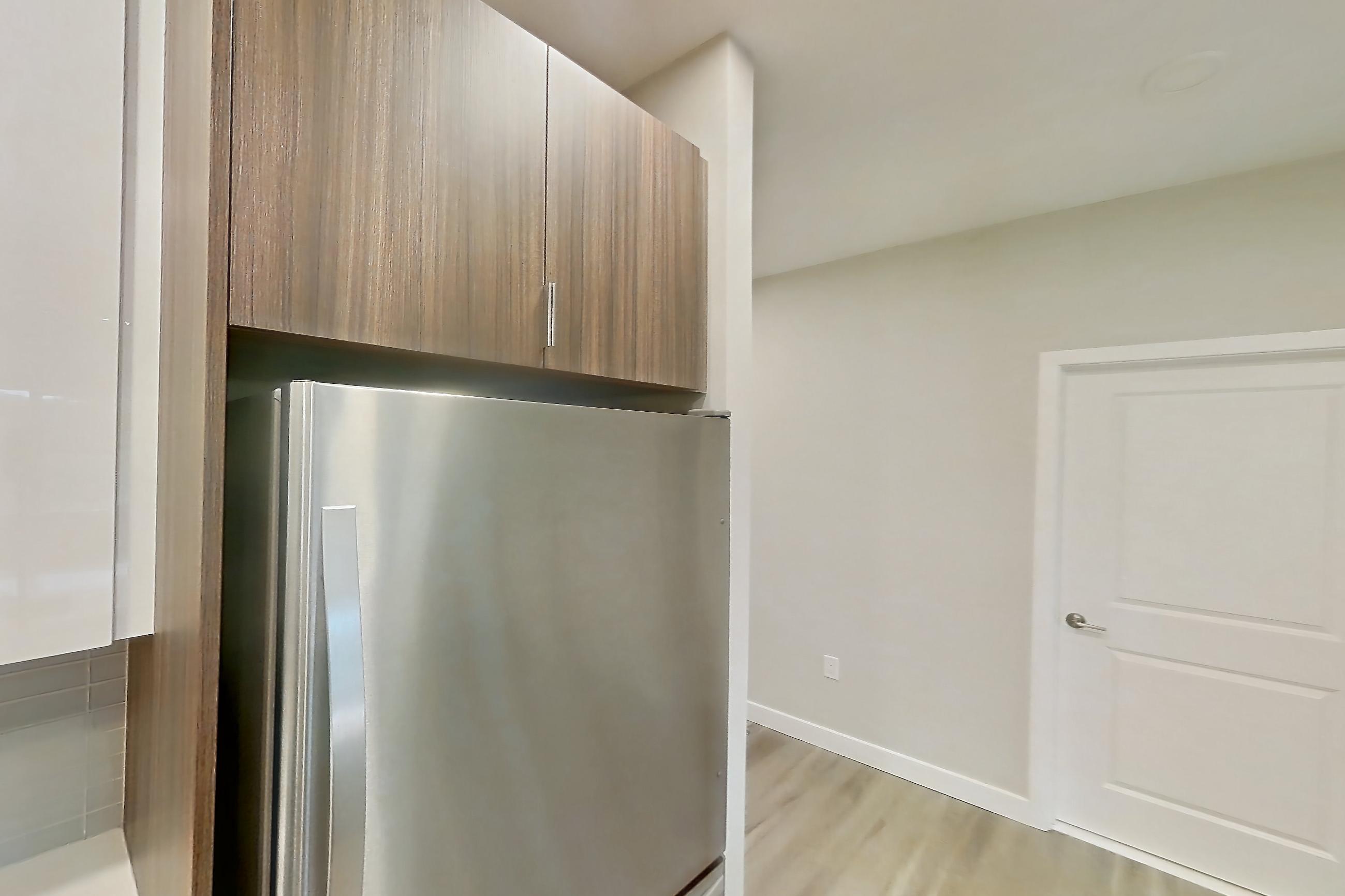 Kitchen in Apartment em-7413 at The Emery at Overlook Ridge, A5 floor plan