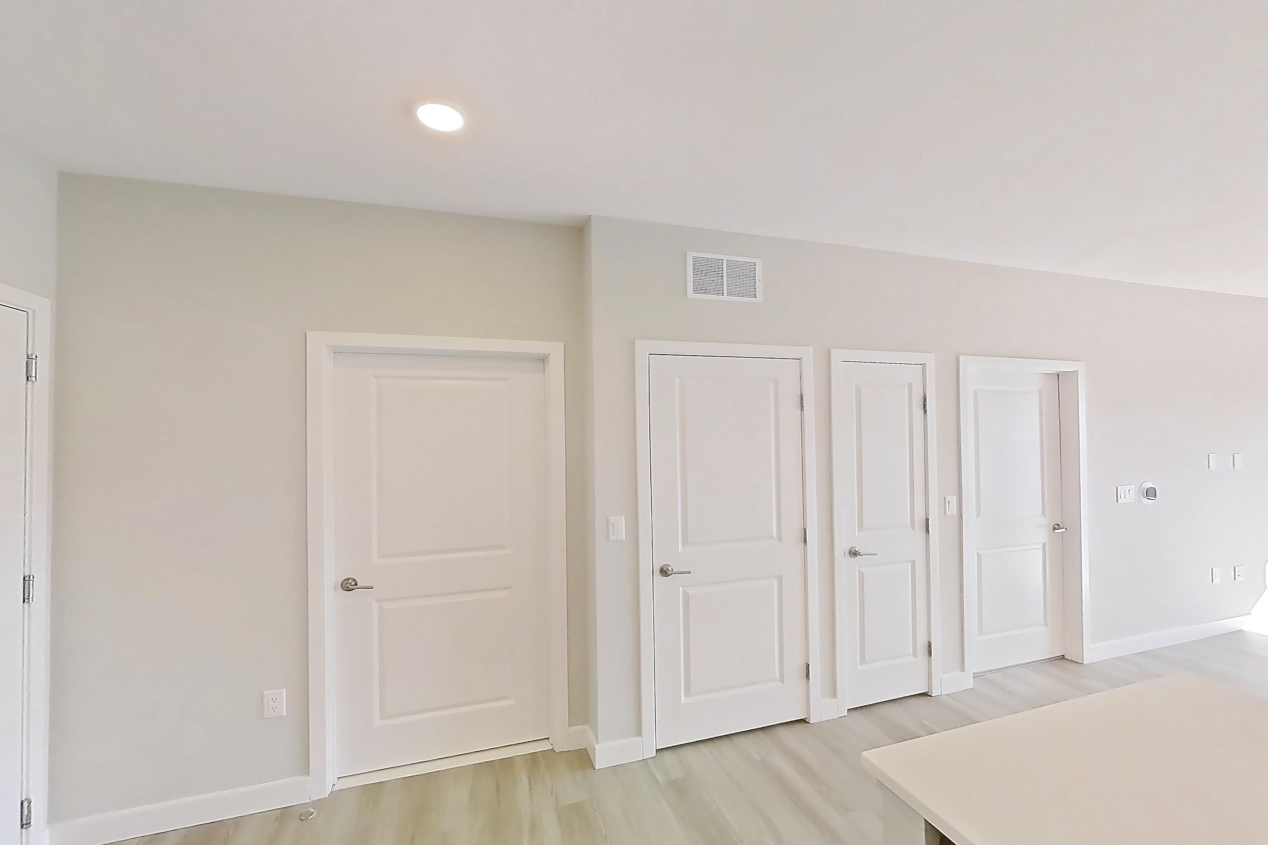 Kitchen in Apartment em-8415 at The Emery at Overlook Ridge, A3 floor plan