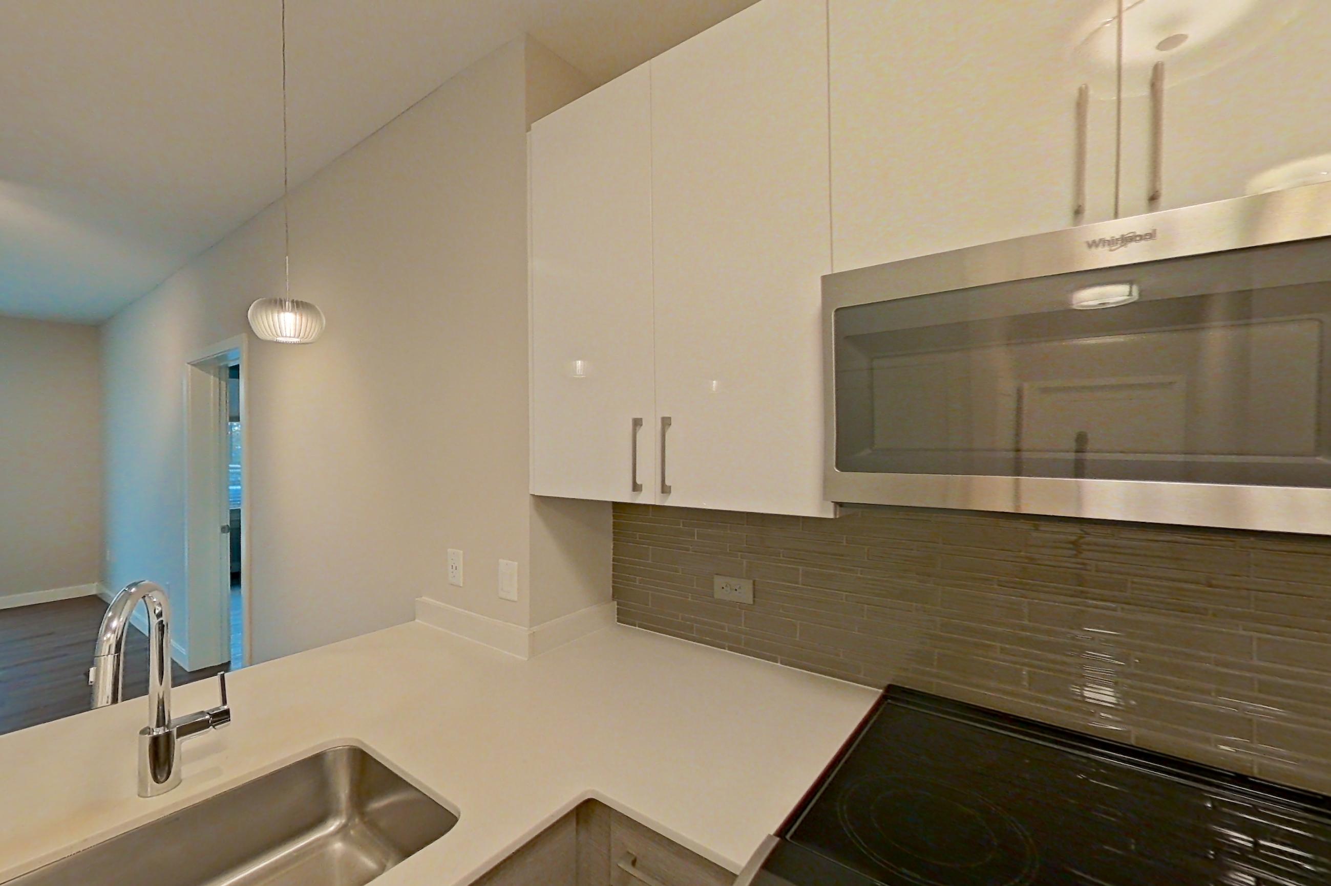 Kitchen in a 2 bd - 2 ba floor plan apartment, representative of Apartment PE2-3306 at Beacon Collection