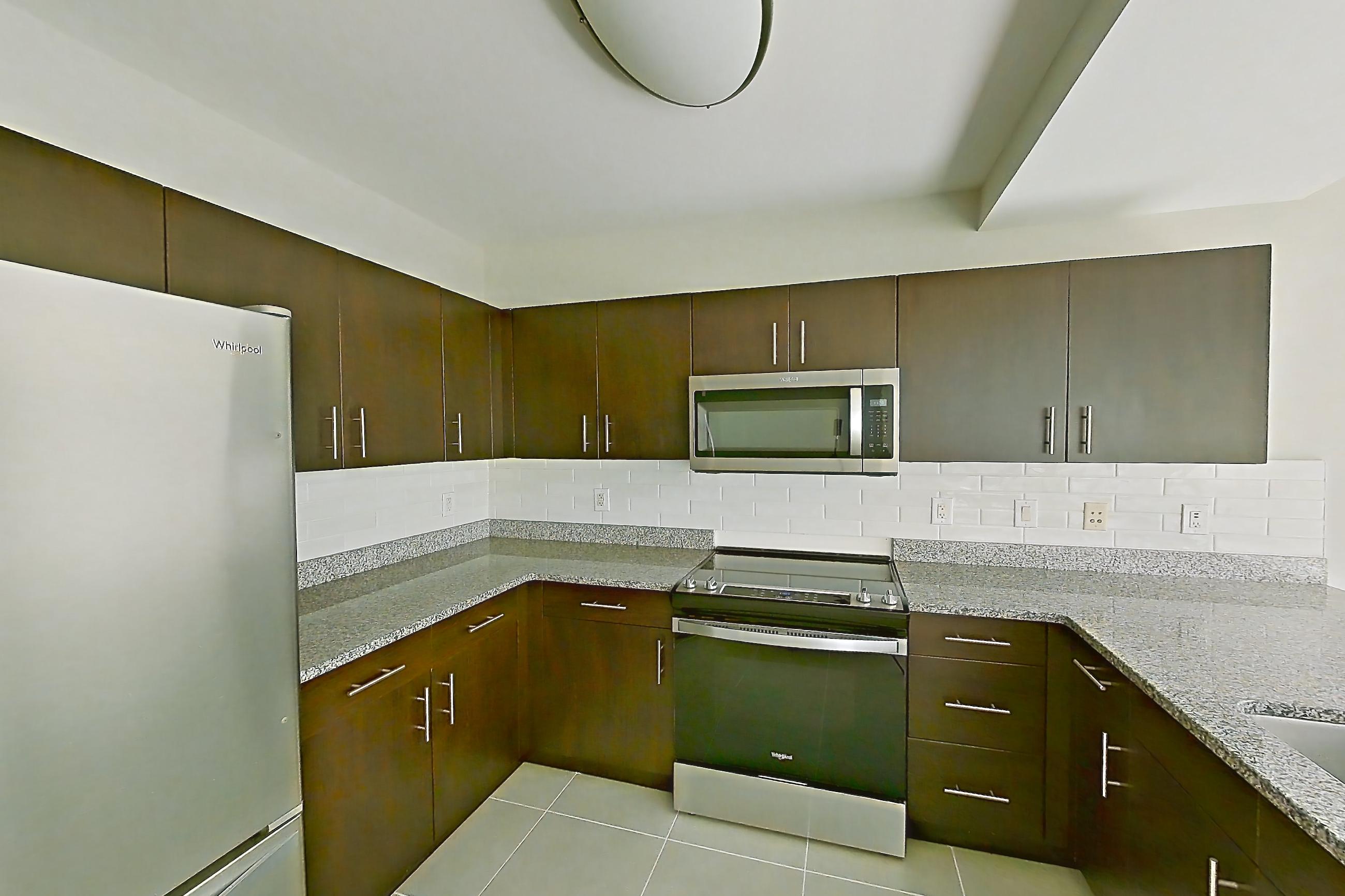 Kitchen in Apartment rt-1122 at RiverTrace at Port Imperial, C3 floor plan
