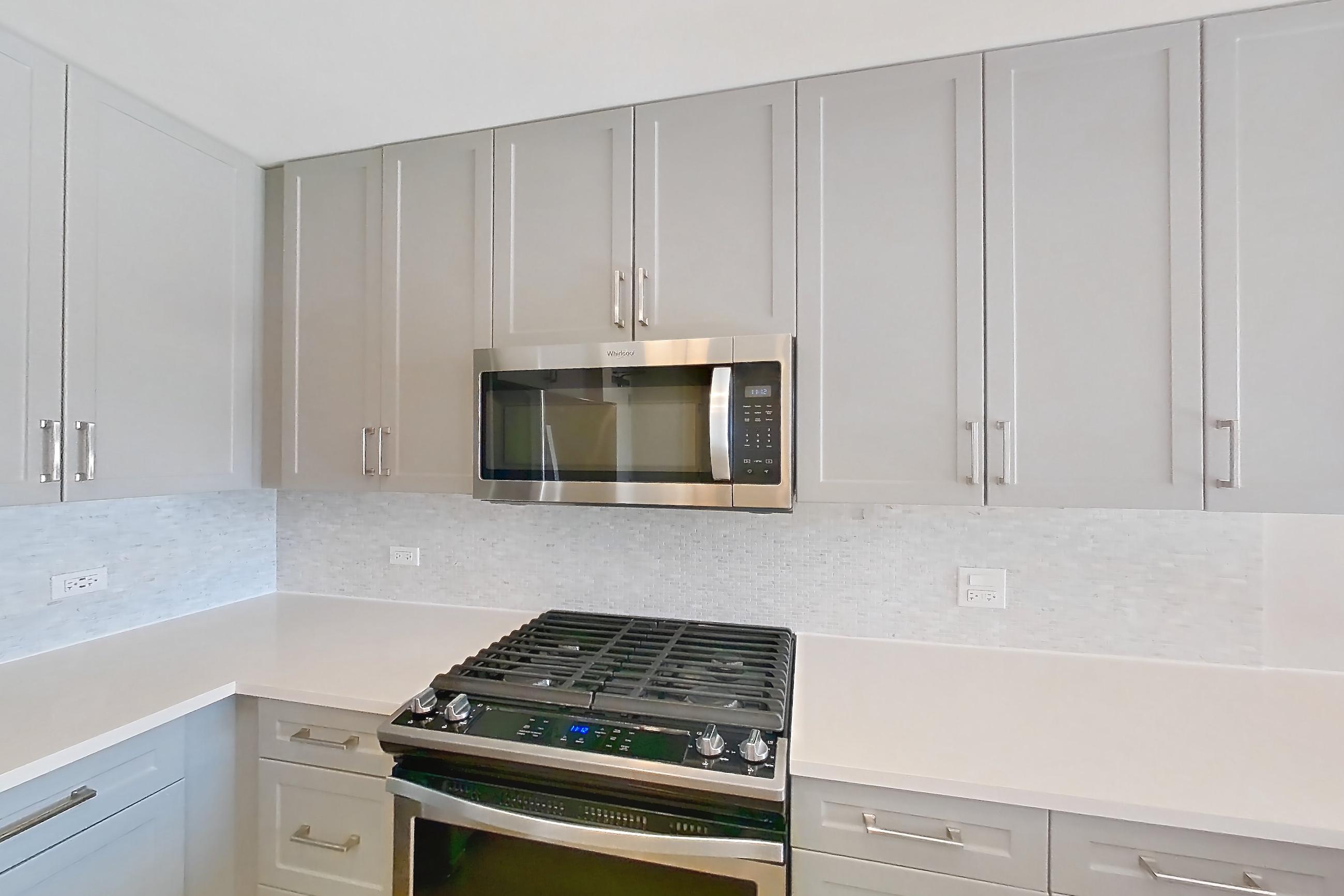 Kitchen in Apartment cap-0942 at The Capstone, CAP-B2, 2 bd - 2 ba floor plan