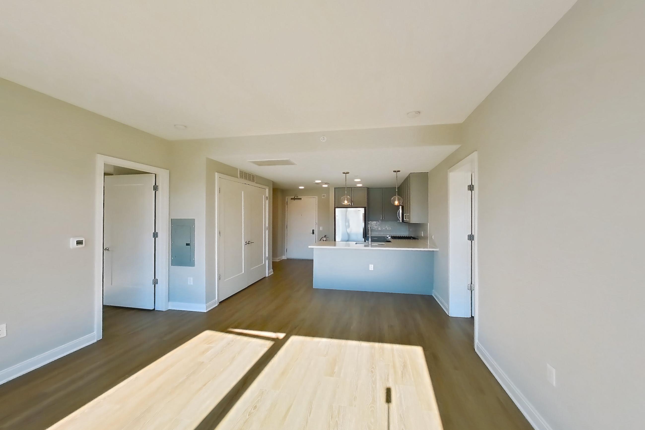 Living room in Apartment cap-0942 at The Capstone, CAP-B2, 2 bd - 2 ba floor plan