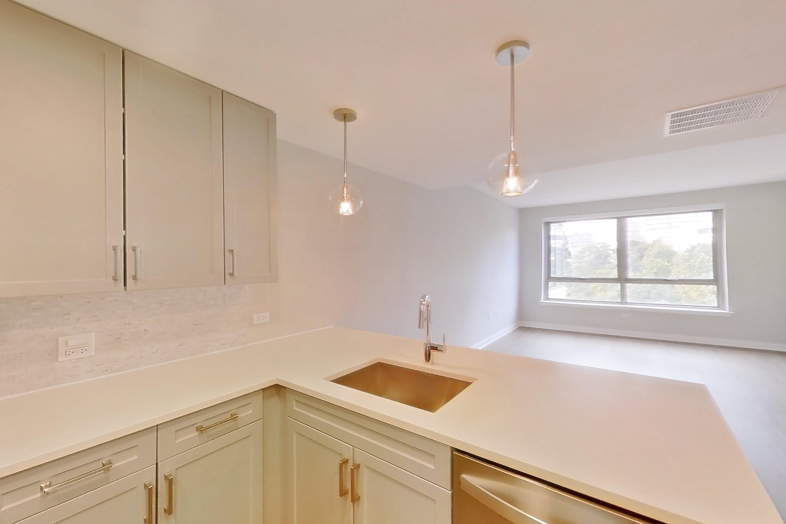 Kitchen in Apartment cap-1135 at The Capstone, CAP-A1, 1 bd - 1 ba floor plan