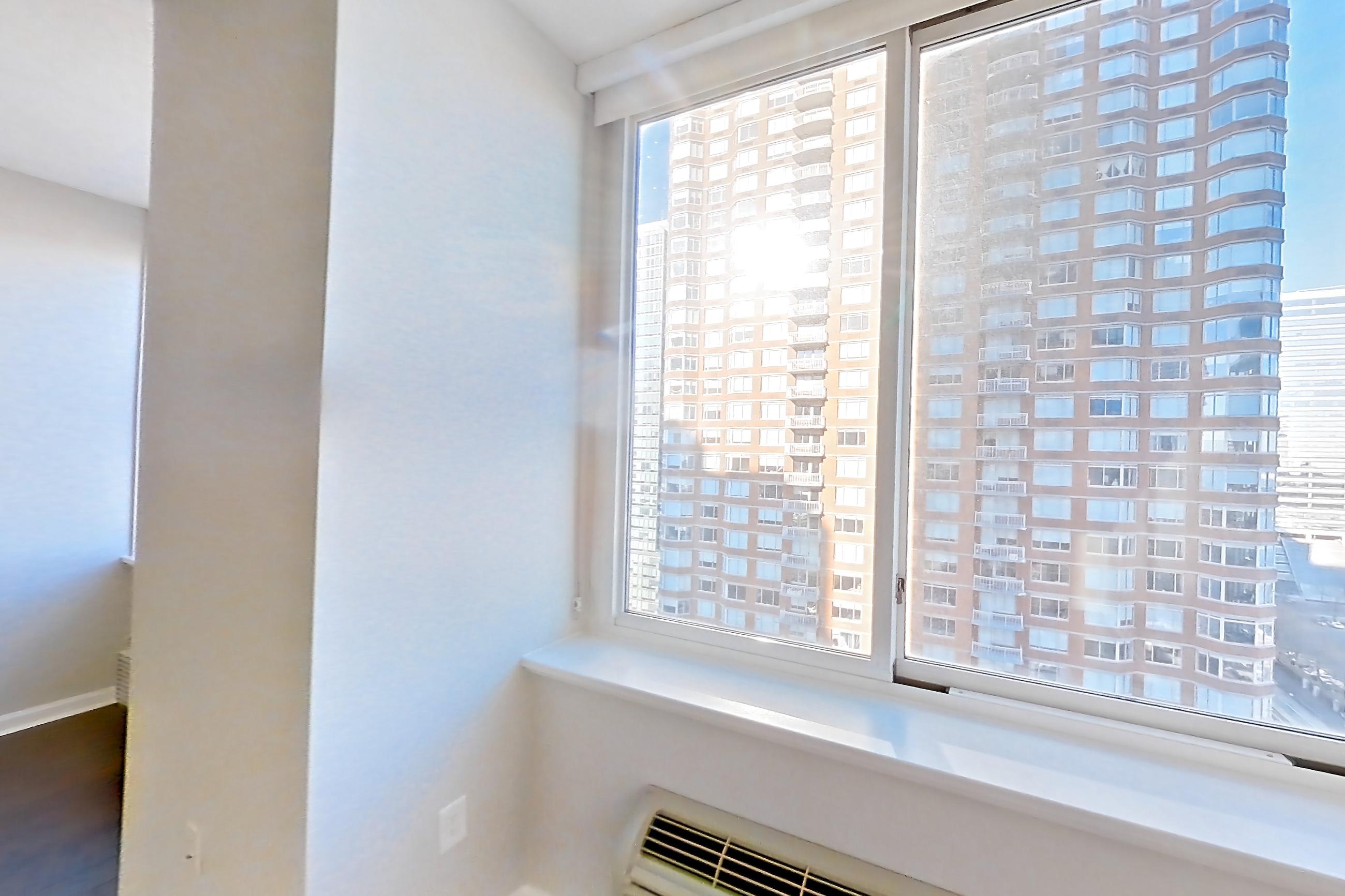 Living room in Apartment m2-1705 at BLVD Collection - 401 Washington Blvd, m2-ms3 floor plan