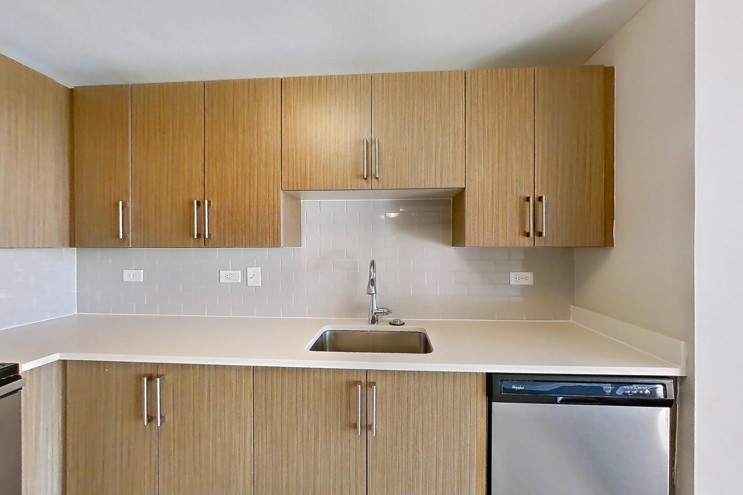 Kitchen in Apartment m2-3306 at BLVD Collection - 401 Washington Blvd, m2-b2 floor plan
