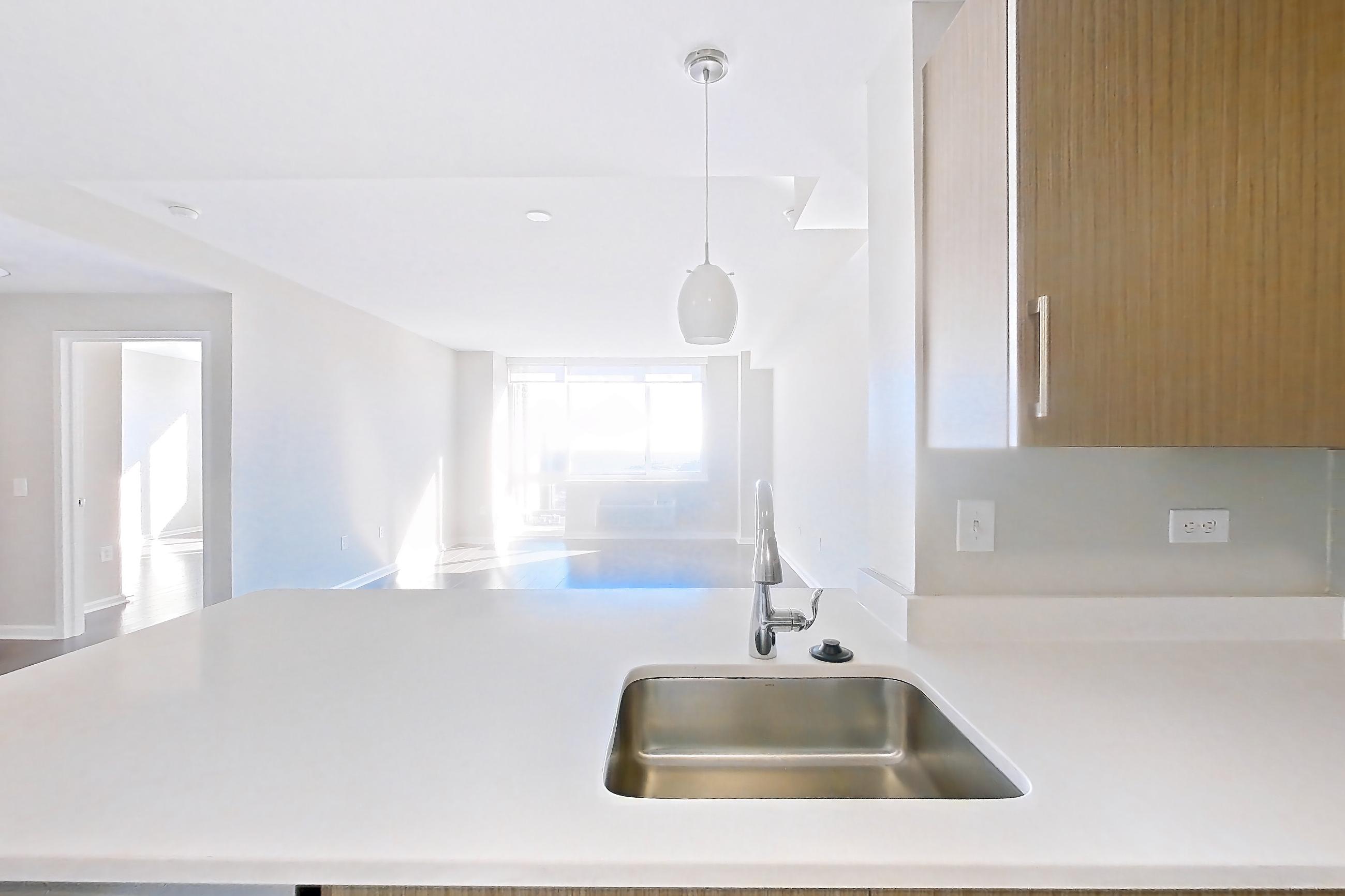 Kitchen in Apartment m2-3808 at BLVD Collection - 401 Washington Blvd, m2-b7 floor plan