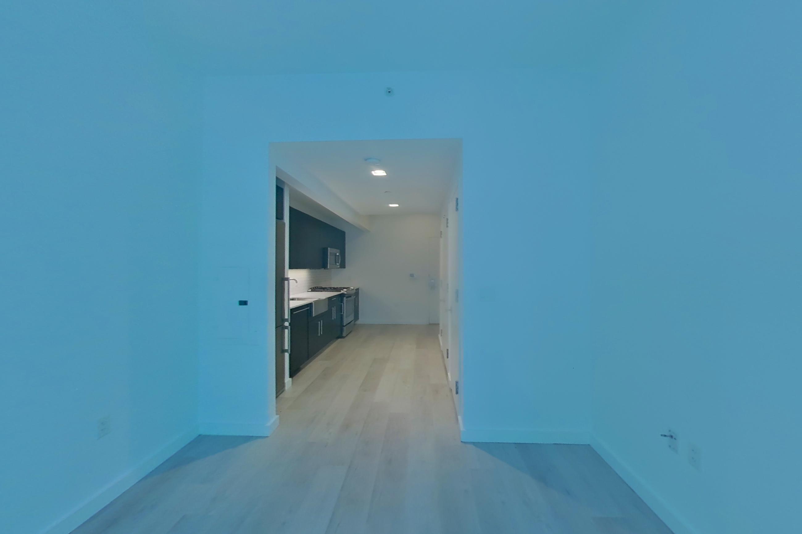 Living space with gas range, oven/range, and stainless steel appliances, Apartment N-1F at 535W43