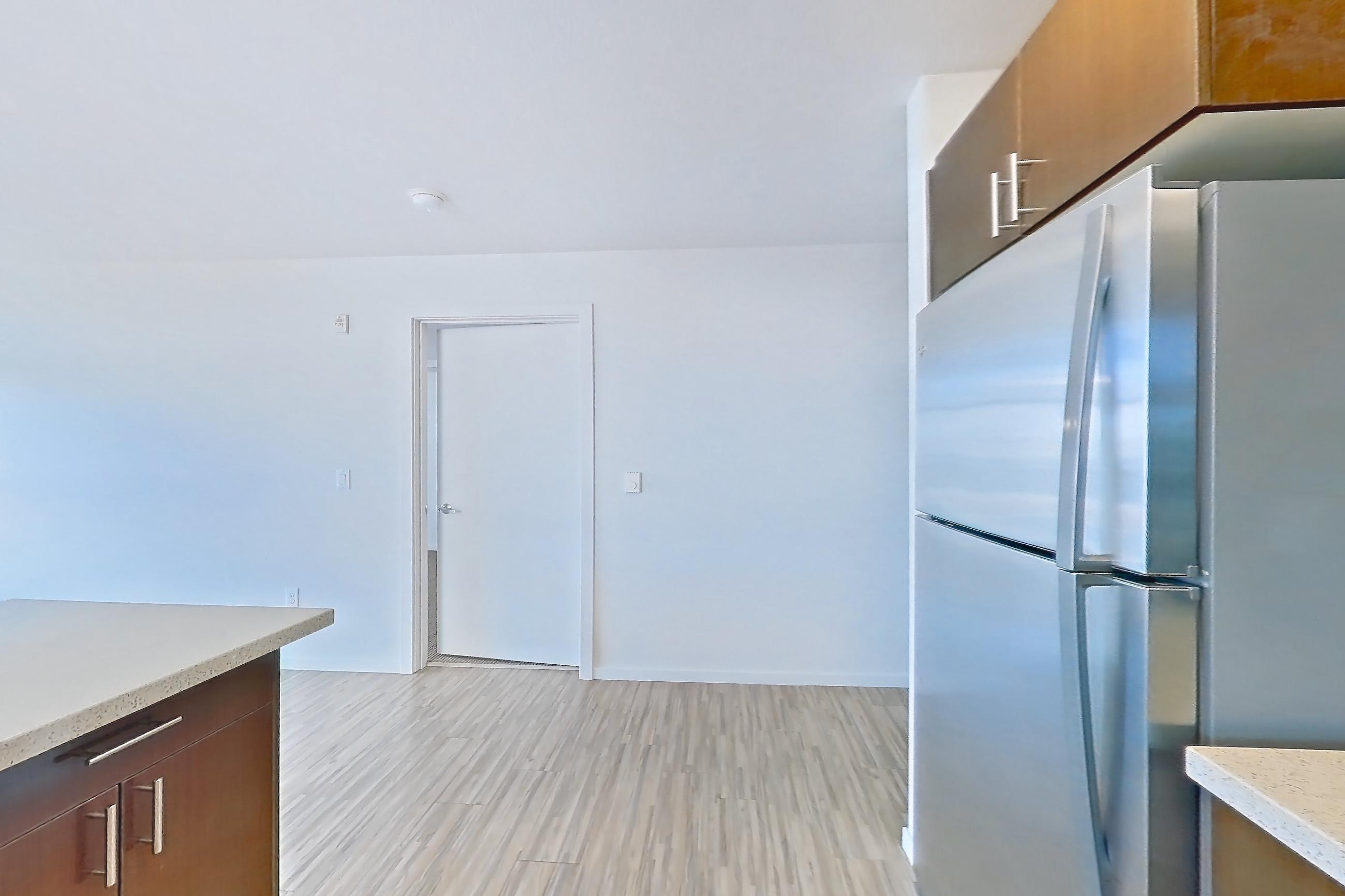 Kitchen island in Apartment l600 at Union SLU, Marquis floor plan