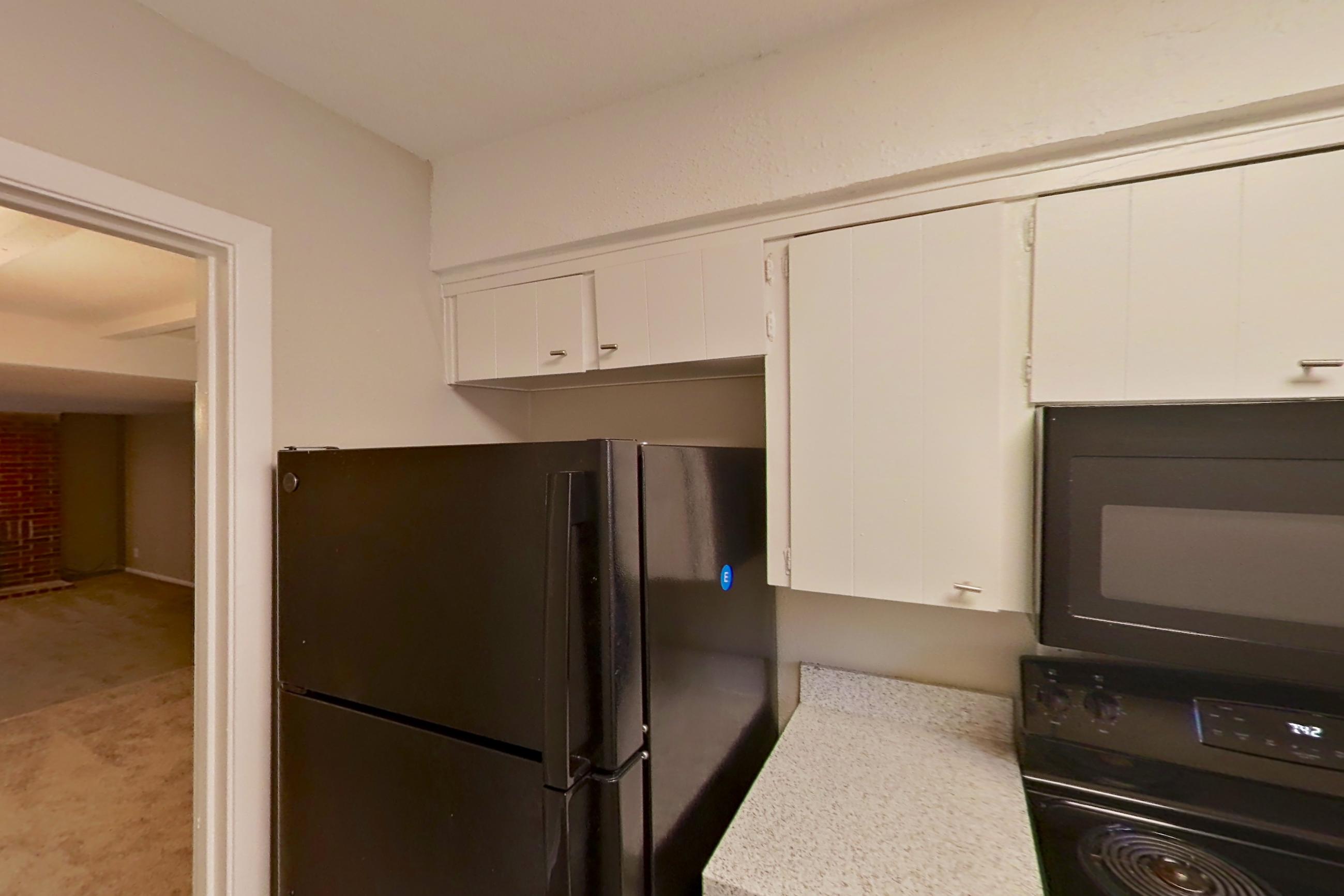 Kitchen in a 2x2 E Elite floor plan apartment, representative of Apartment 1426C at The Life at Legacy Fountains