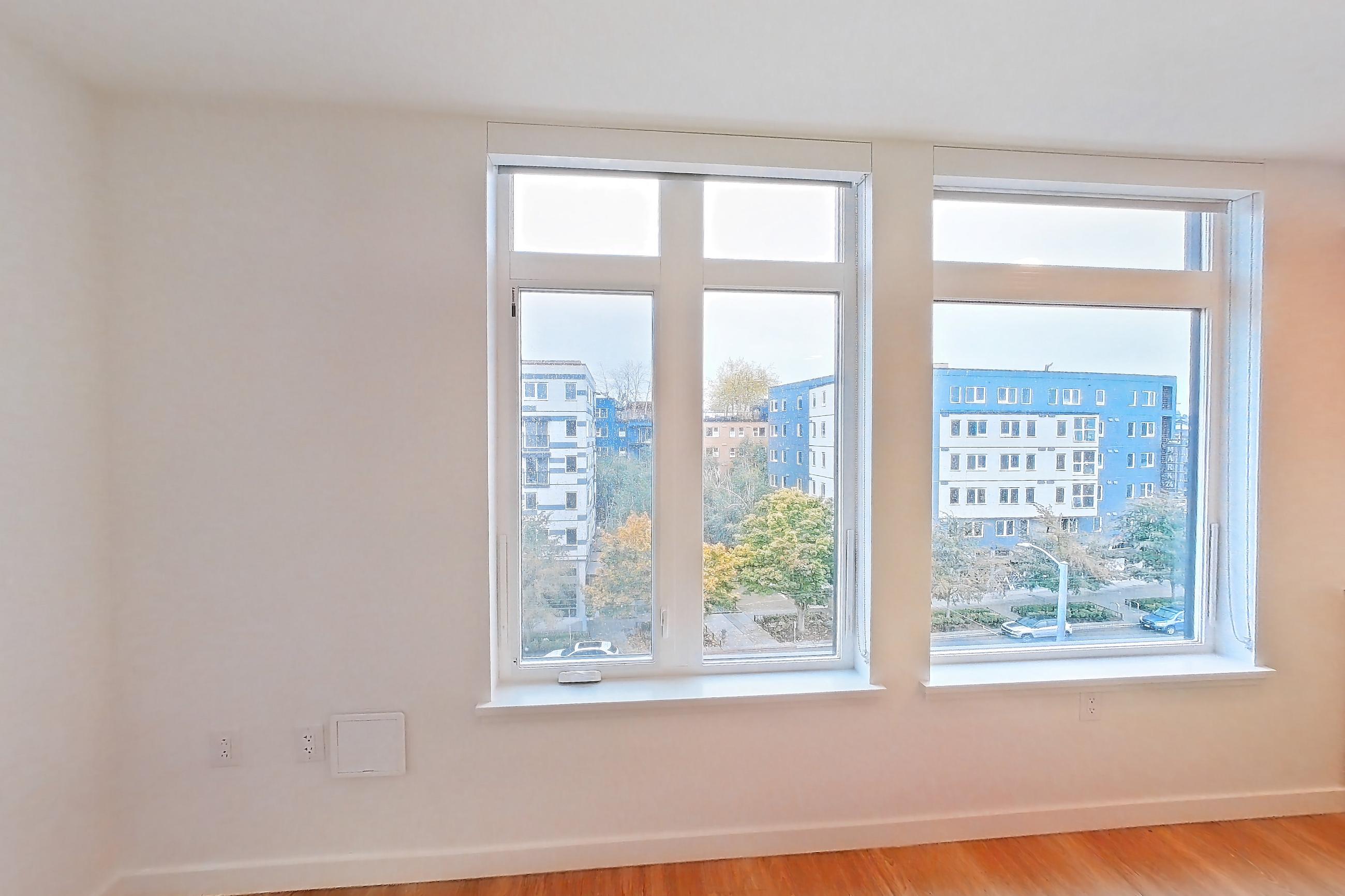 Living room, Apartment 721 at Ballard Yards