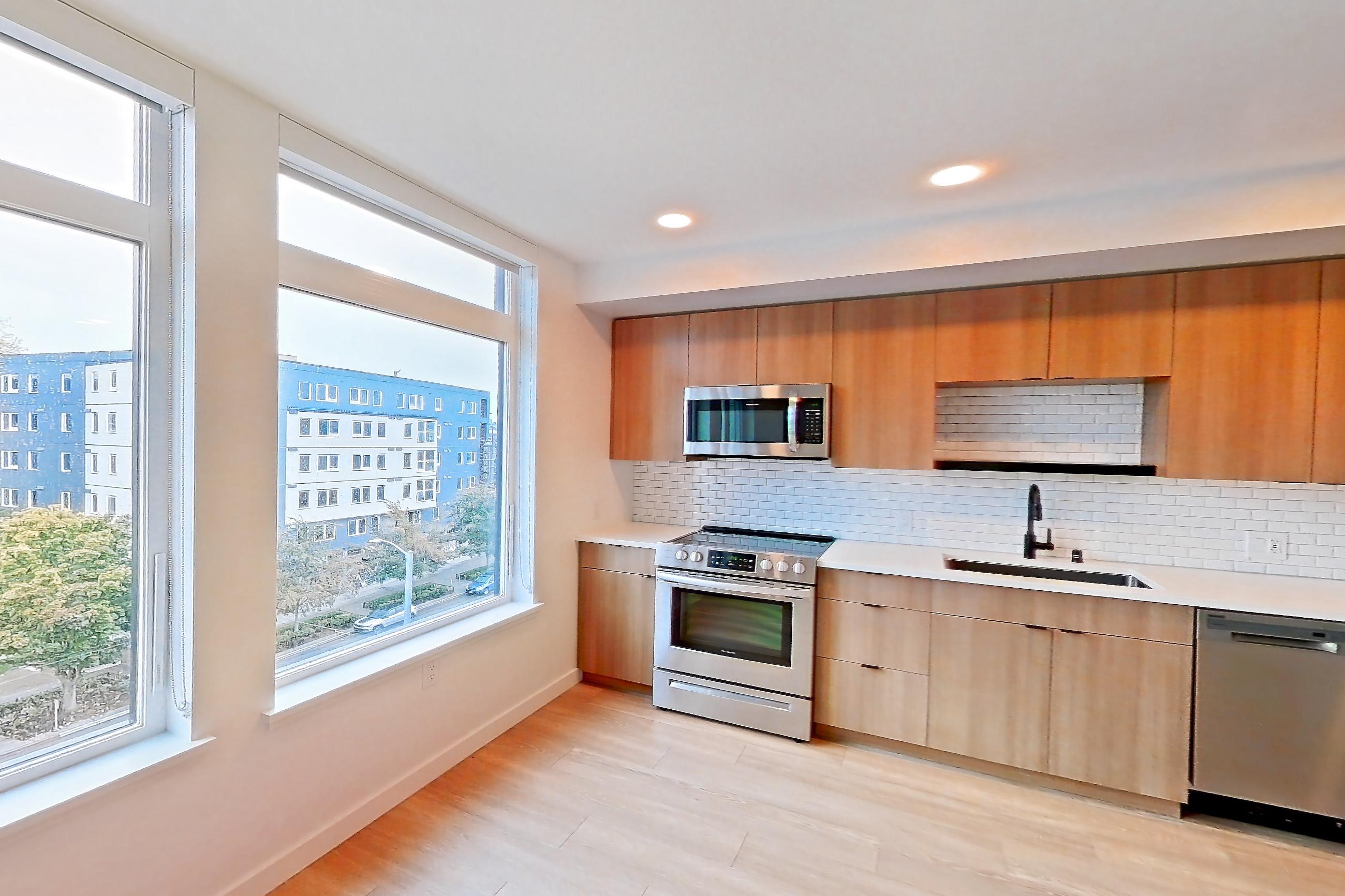 Living room, Apartment 721 at Ballard Yards