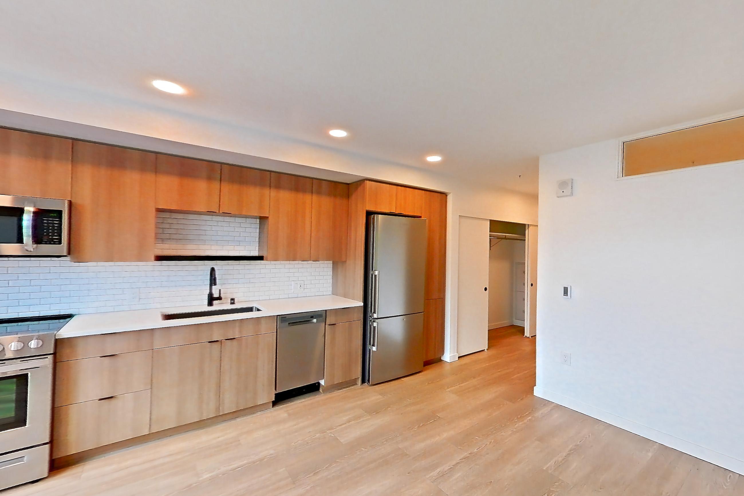 Living room, Apartment 721 at Ballard Yards