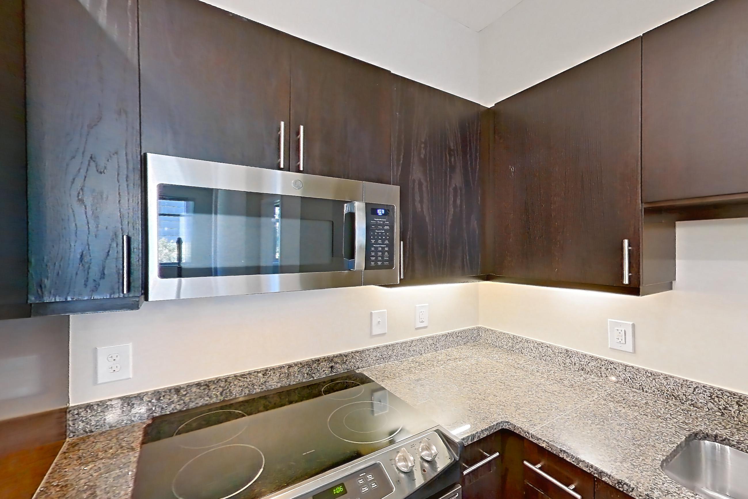 Kitchen in Apartment 0309 at The Avant at Reston Town Center, B1 floor plan