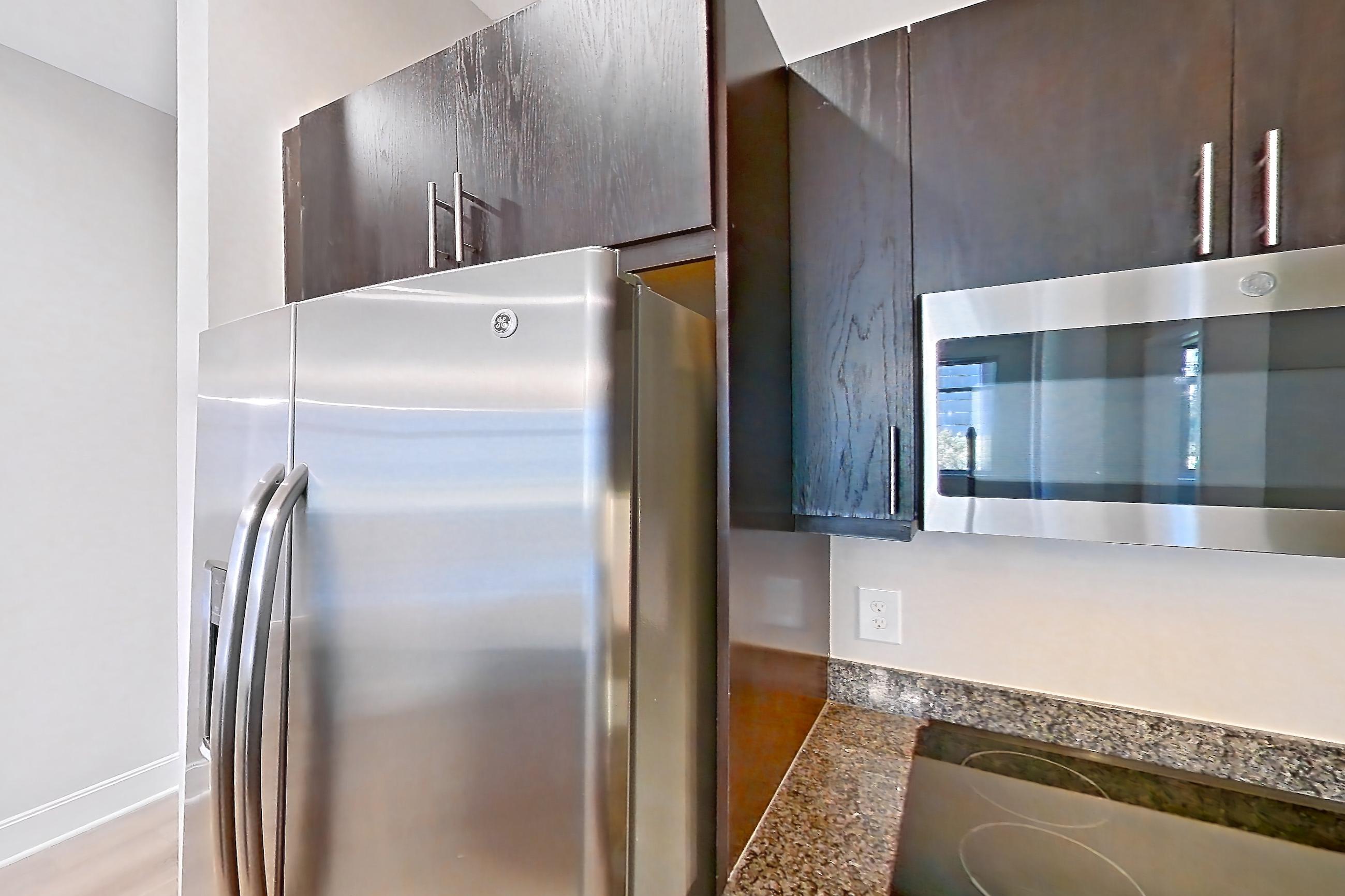 Kitchen in Apartment 0309 at The Avant at Reston Town Center, B1 floor plan
