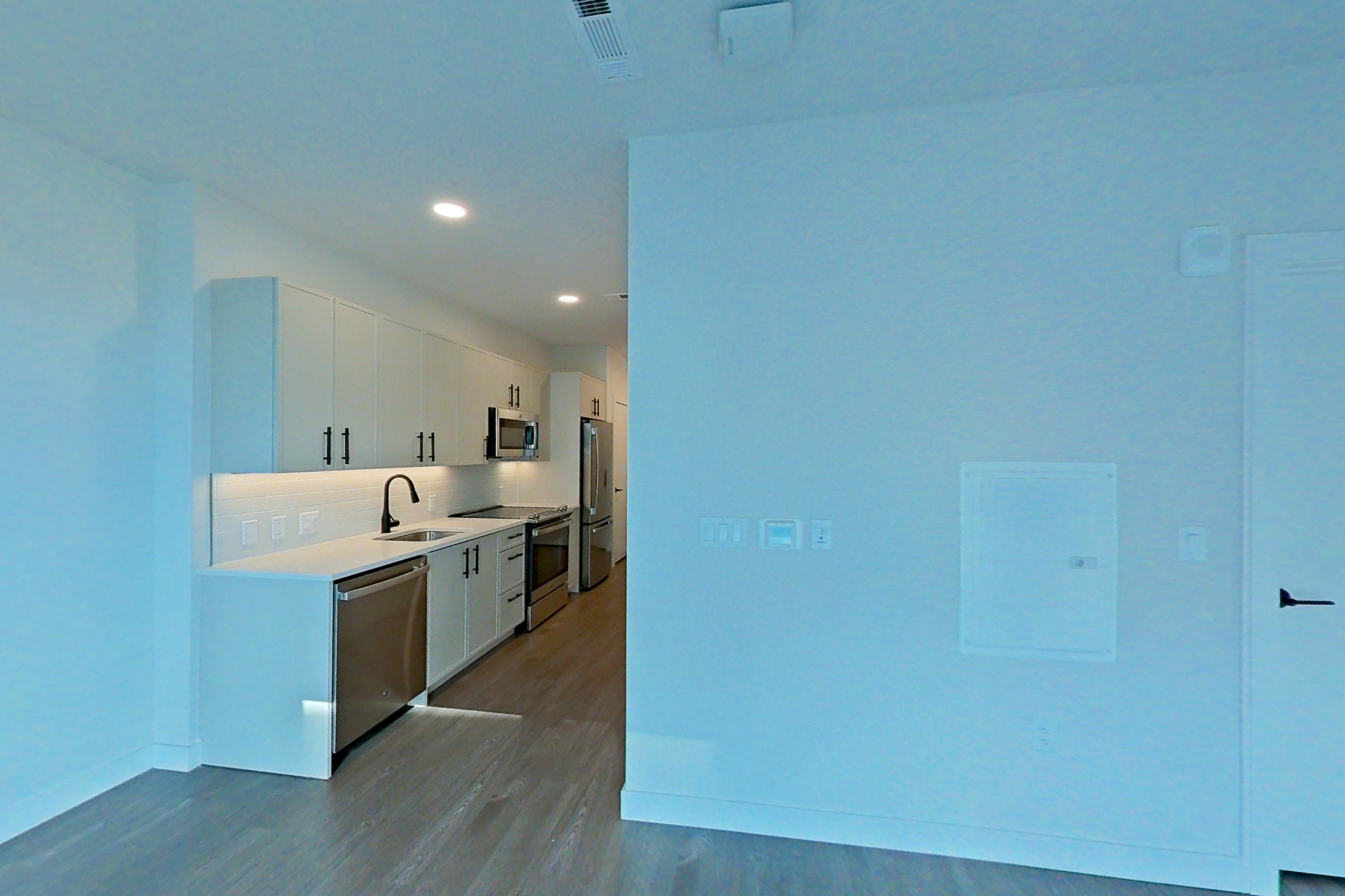 Living space in Apartment c306 at The Laurent, Studio-S1 floor plan