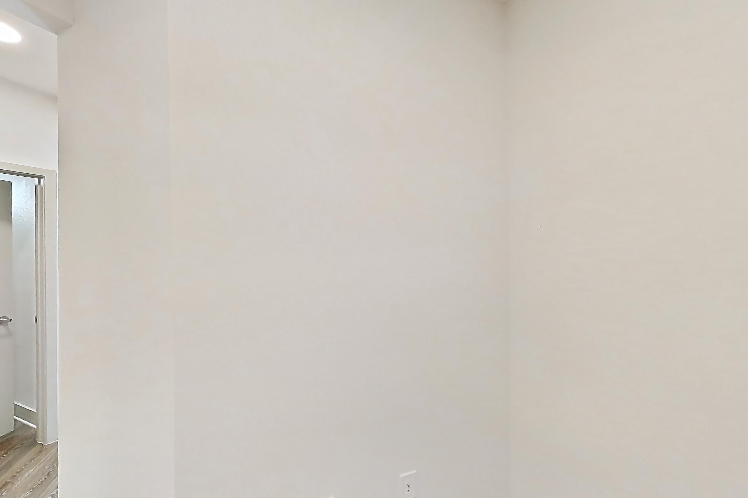 Living space with dark wood-finish flooring and light wood-finish flooring, Apartment B2-304 at Lantower Grande Flats