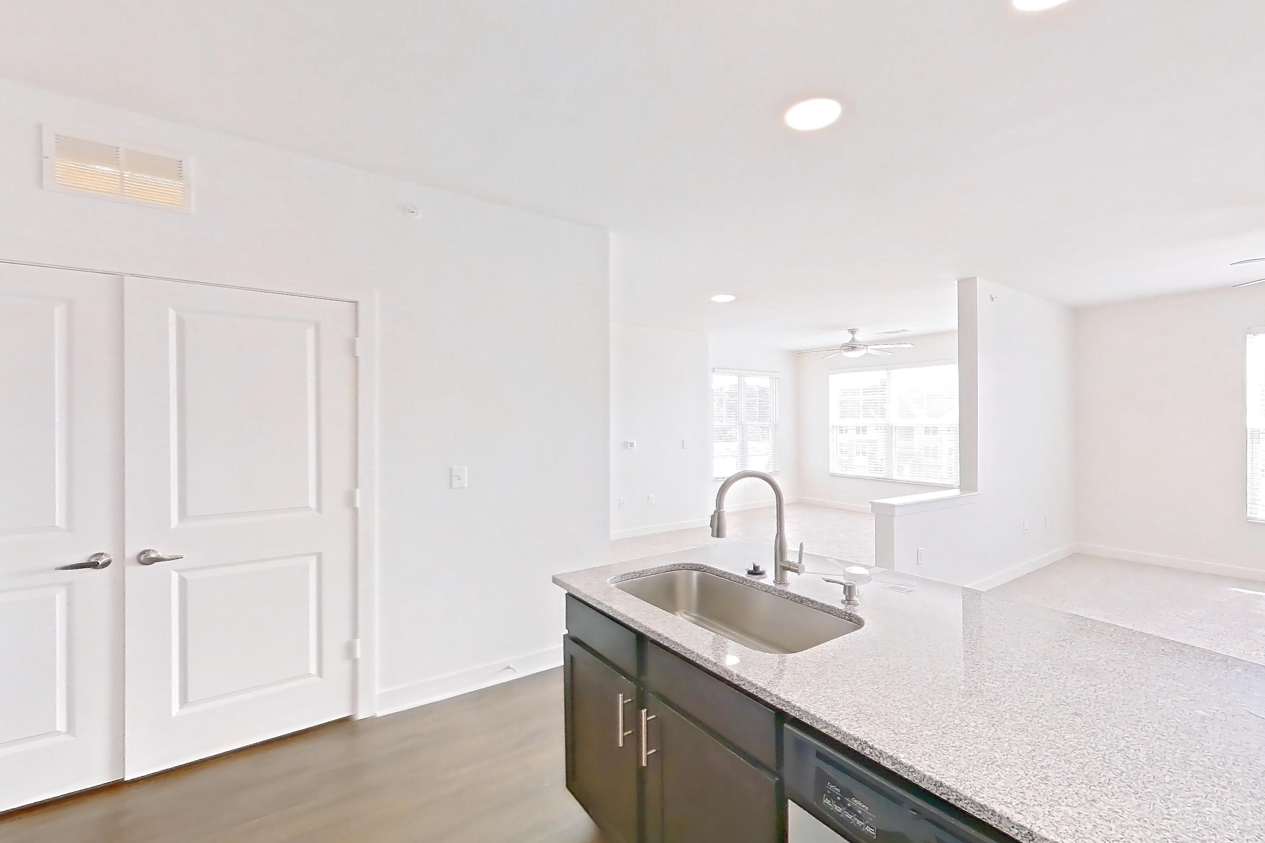 Kitchen in Apartment 303 at Realm at Patterson Place, A1SR floor plan