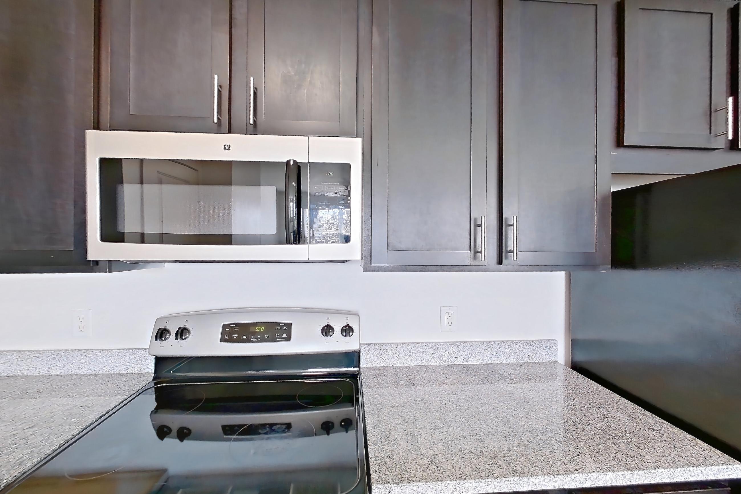 Kitchen in Apartment 303 at Realm at Patterson Place, A1SR floor plan