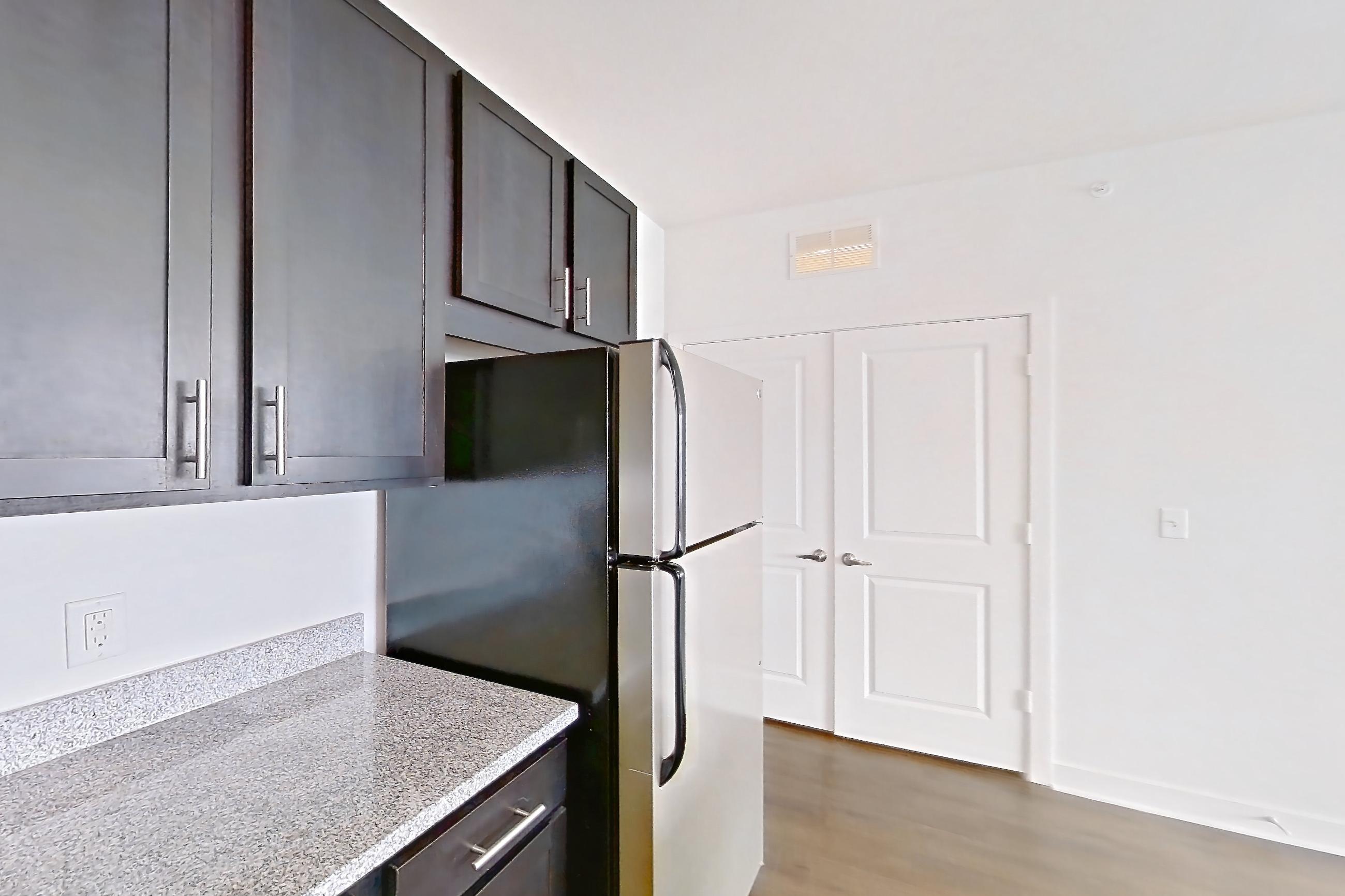 Kitchen in Apartment 303 at Realm at Patterson Place, A1SR floor plan