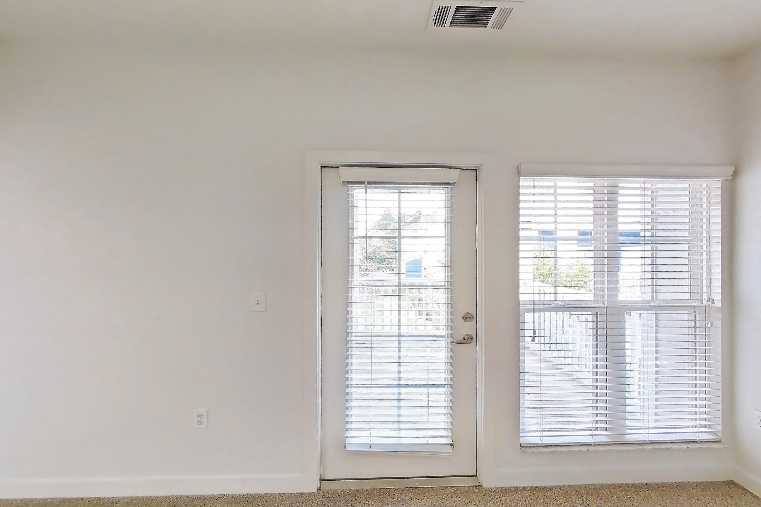 Living room, Apartment 208 at Realm at Patterson Place