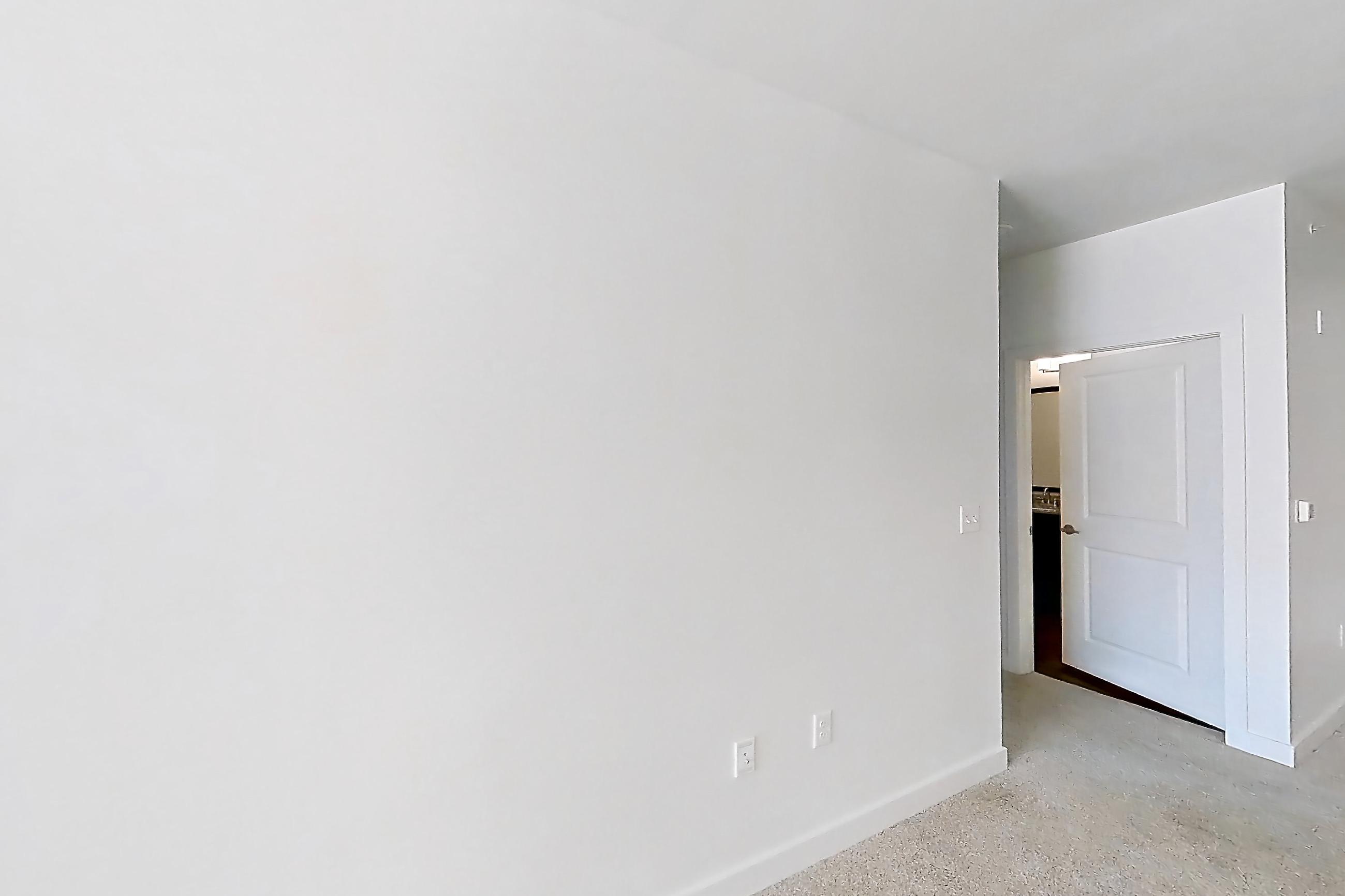 Living room with light carpet, Apartment 301 at Realm at Patterson Place