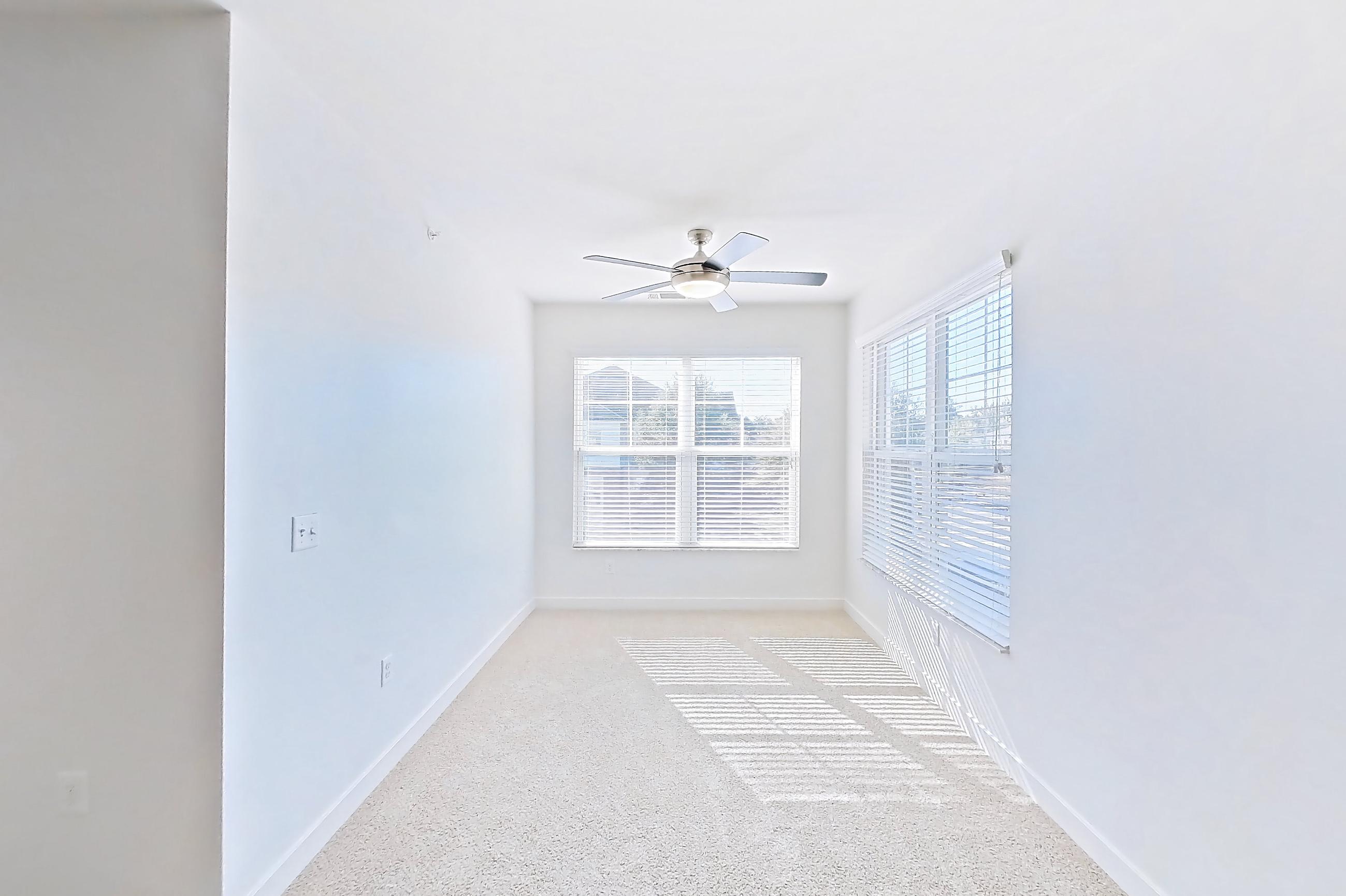 Living room with light carpet, Apartment 301 at Realm at Patterson Place