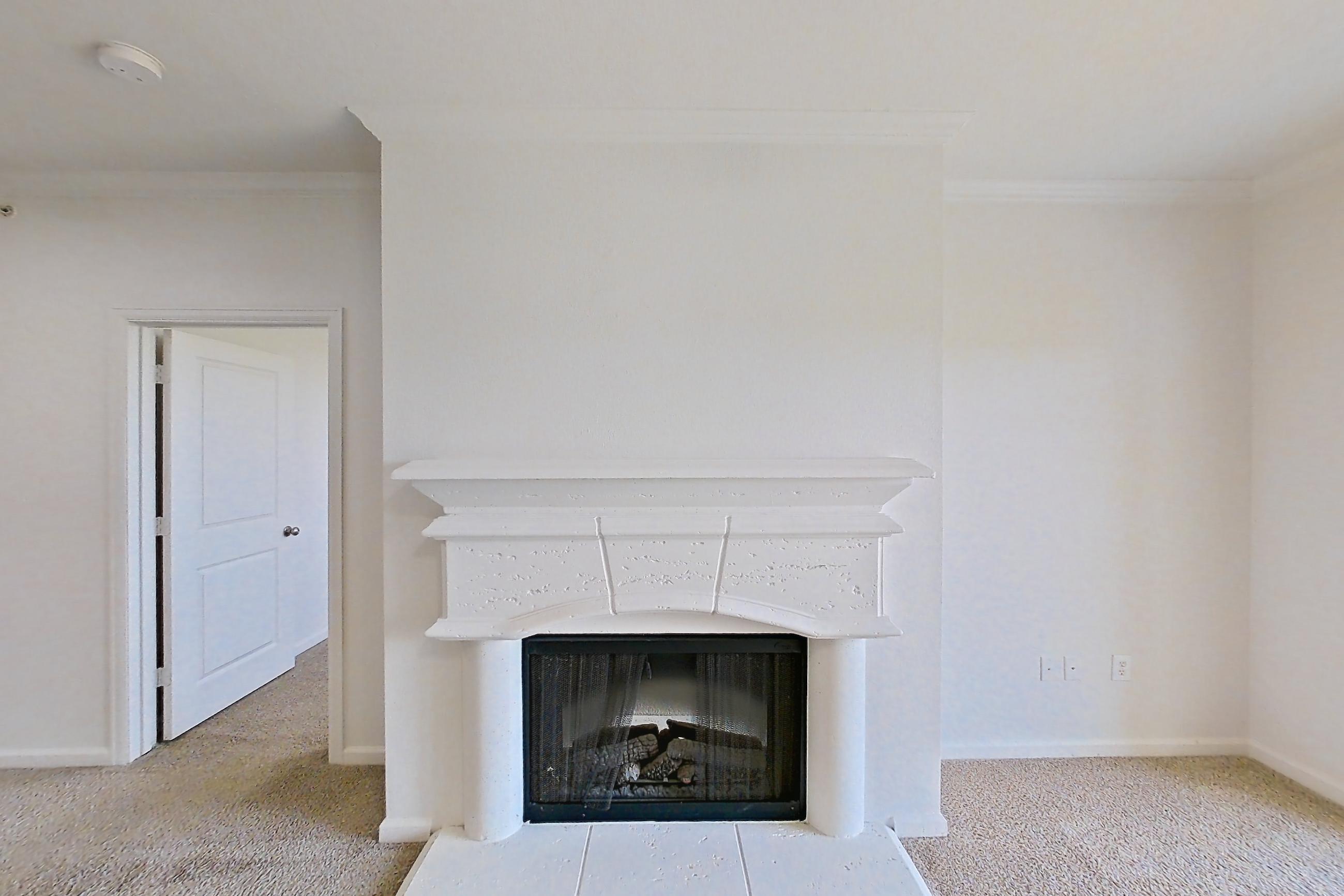 Living space with fireplace, Apartment 631 at The Cortona