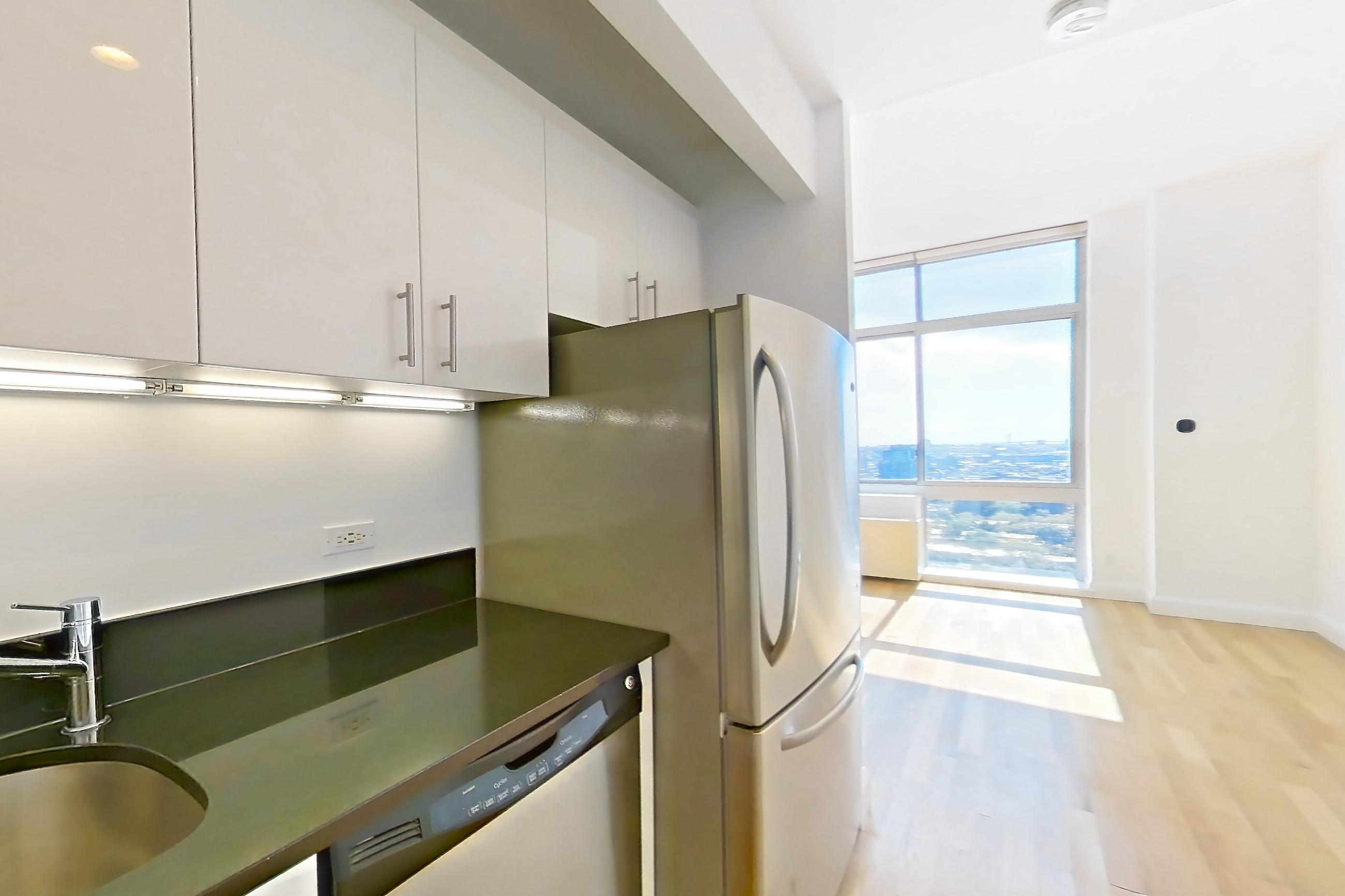 Kitchen in Apartment 27d at The Addison, Studio 1 bath floor plan
