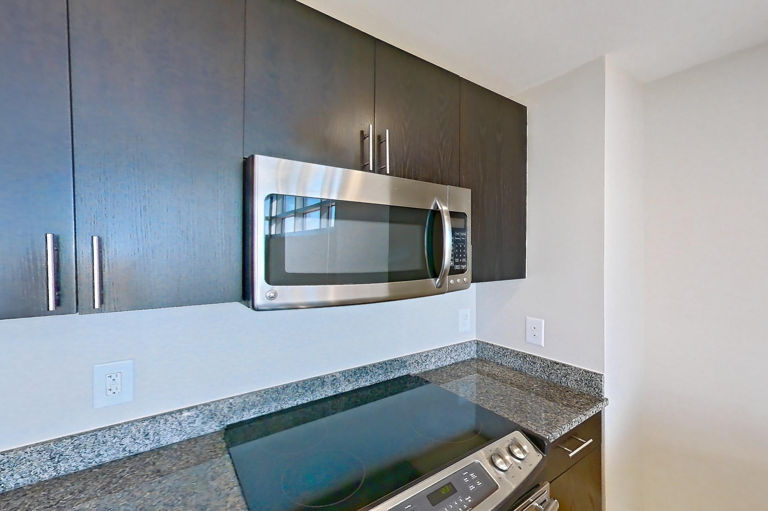Kitchen in Apartment 0624 at The Avant at Reston Town Center, B2 floor plan