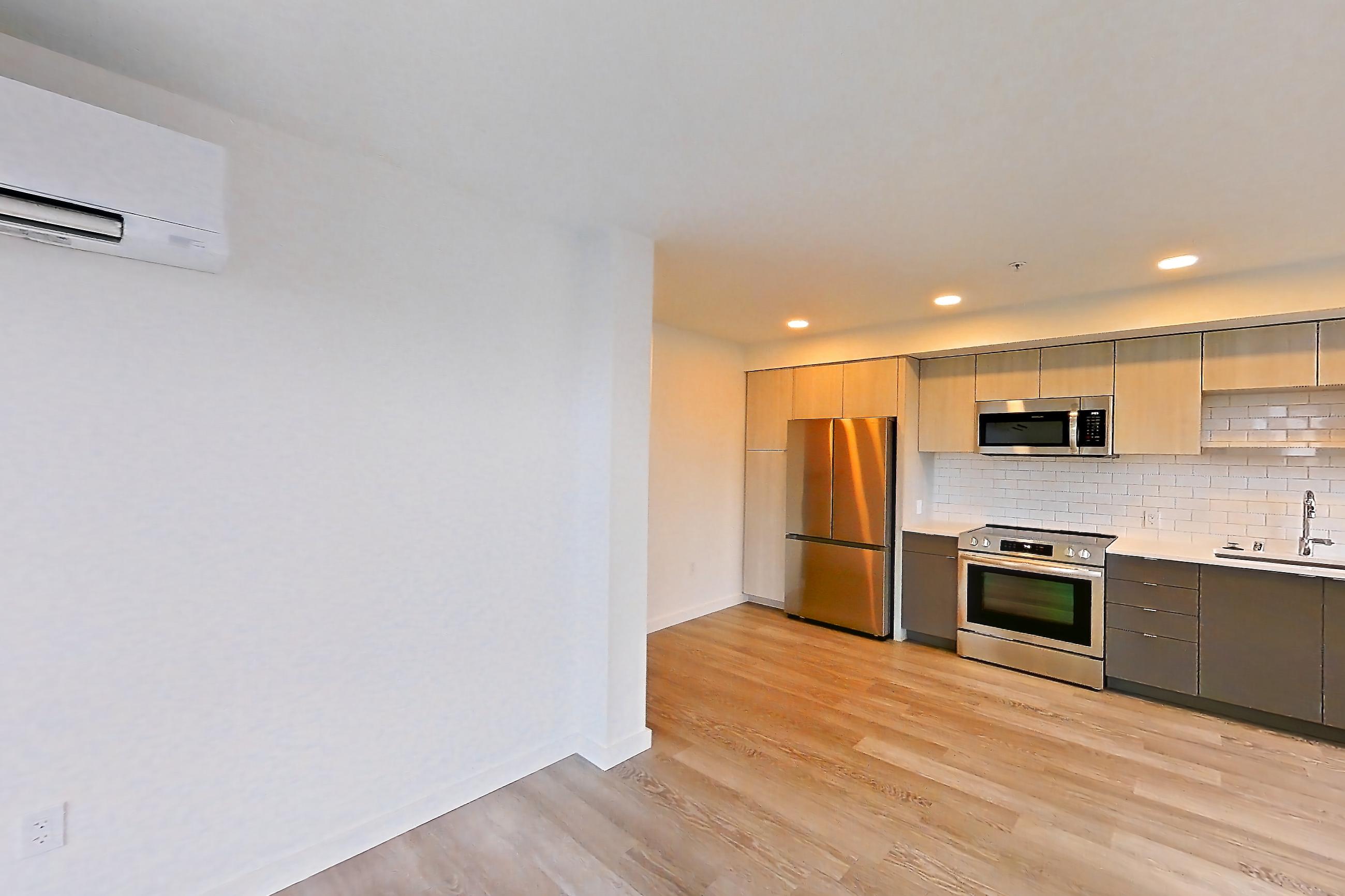 Living room, Apartment 407 at The Victor