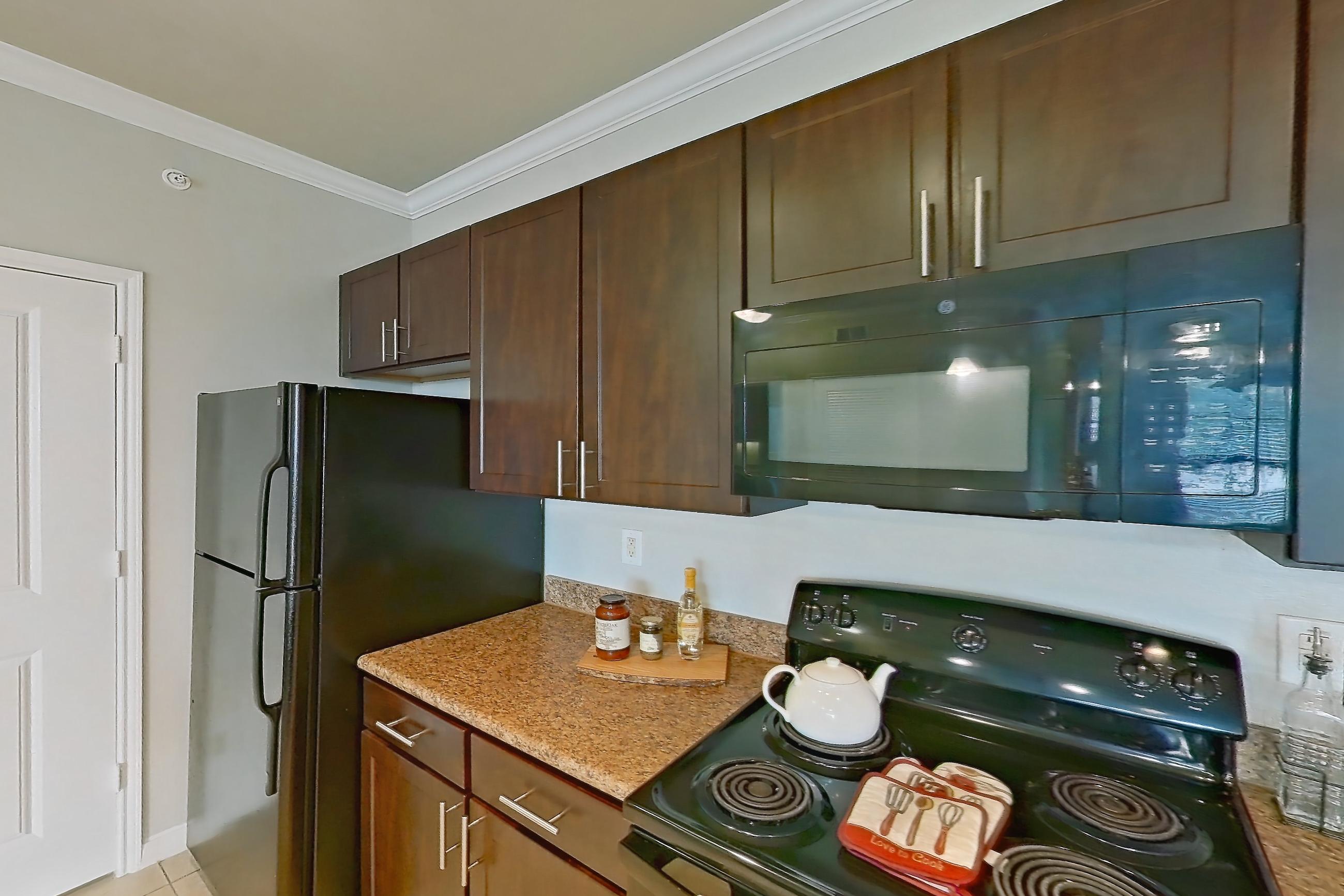 Kitchen in Apartment 0323 at Marquis at Sugar Land, 1B floor plan