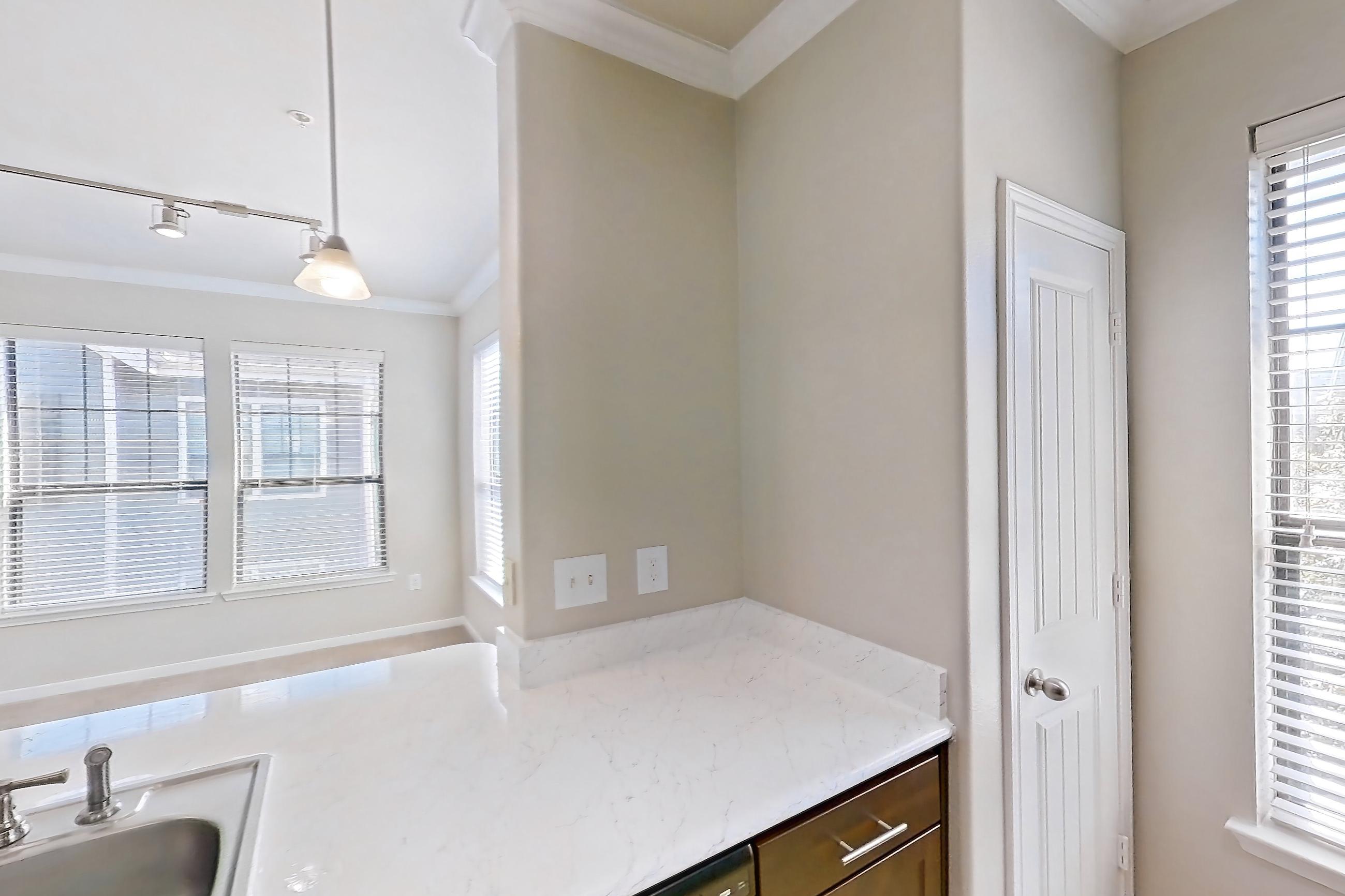 Kitchen in Apartment 1032 at Marquis at Sugar Land, 2B floor plan