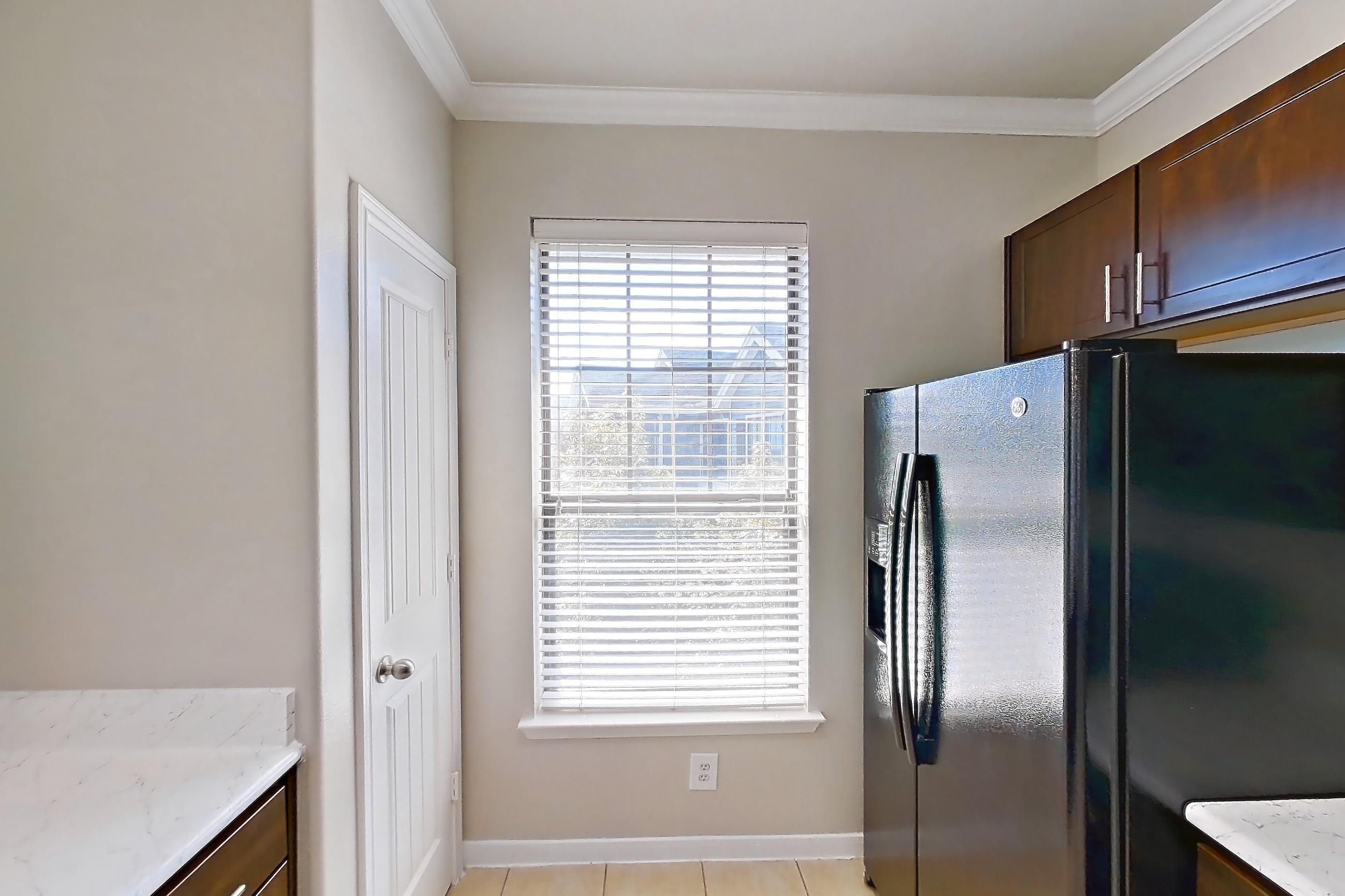 Kitchen in Apartment 1032 at Marquis at Sugar Land, 2B floor plan