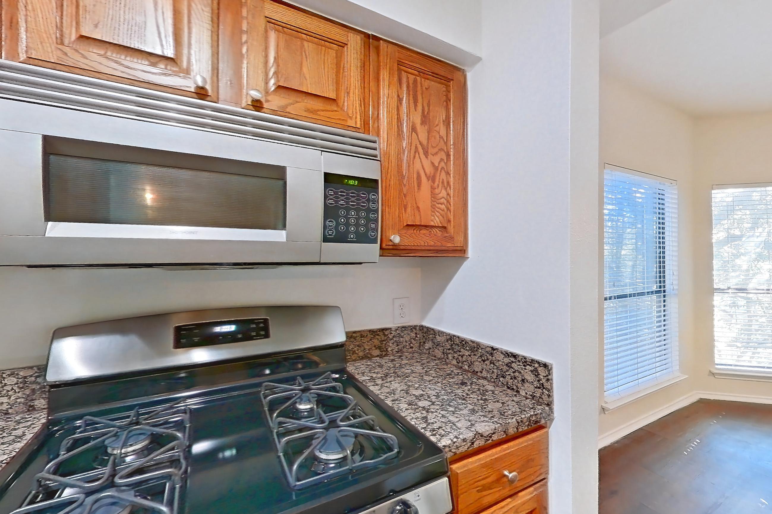 Kitchen in Apartment 0702 at Marquis at Caprock Canyon, 2C floor plan