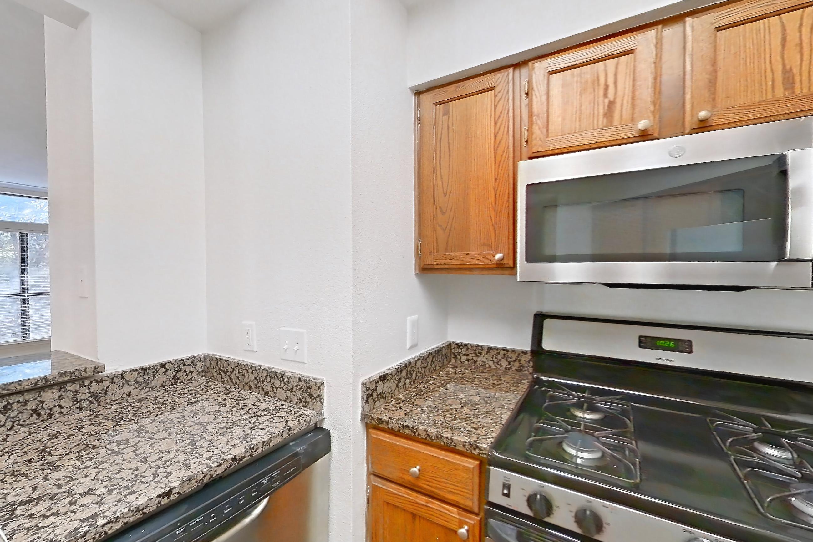 Kitchen in Apartment 2101 at Marquis at Caprock Canyon, 2B floor plan