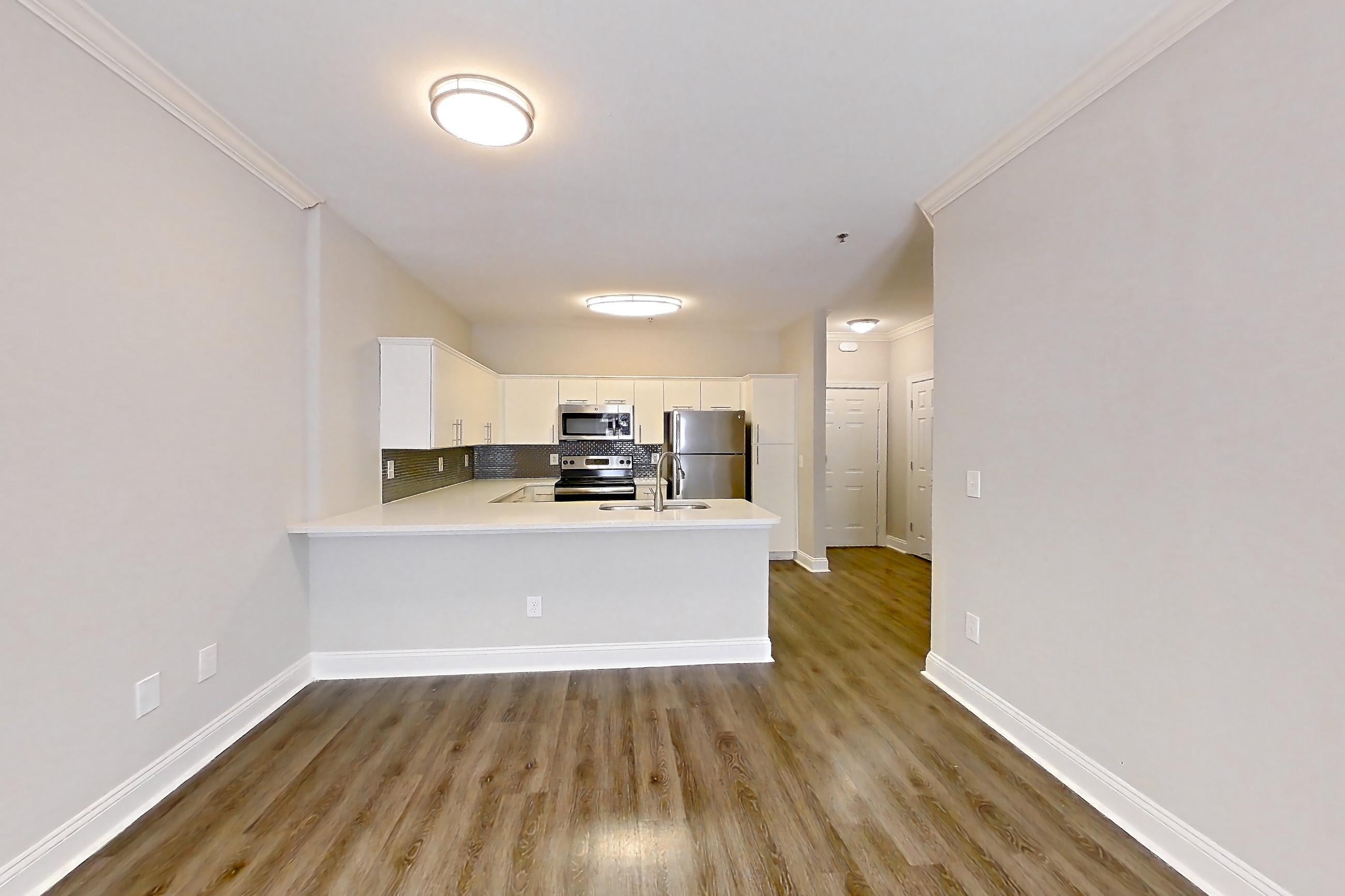 Living room with light countertops, Apartment 2114 at Marq Perimeter