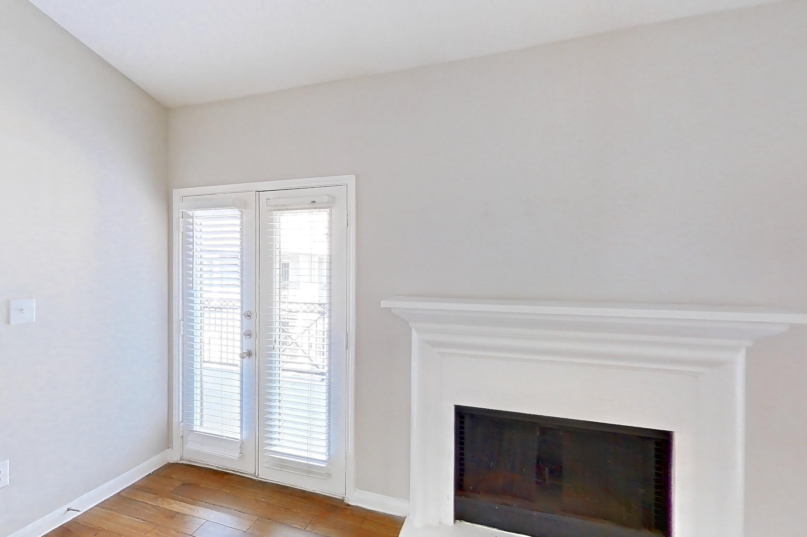 Living room with fireplace, Apartment 0732 at Marquis on Westheimer