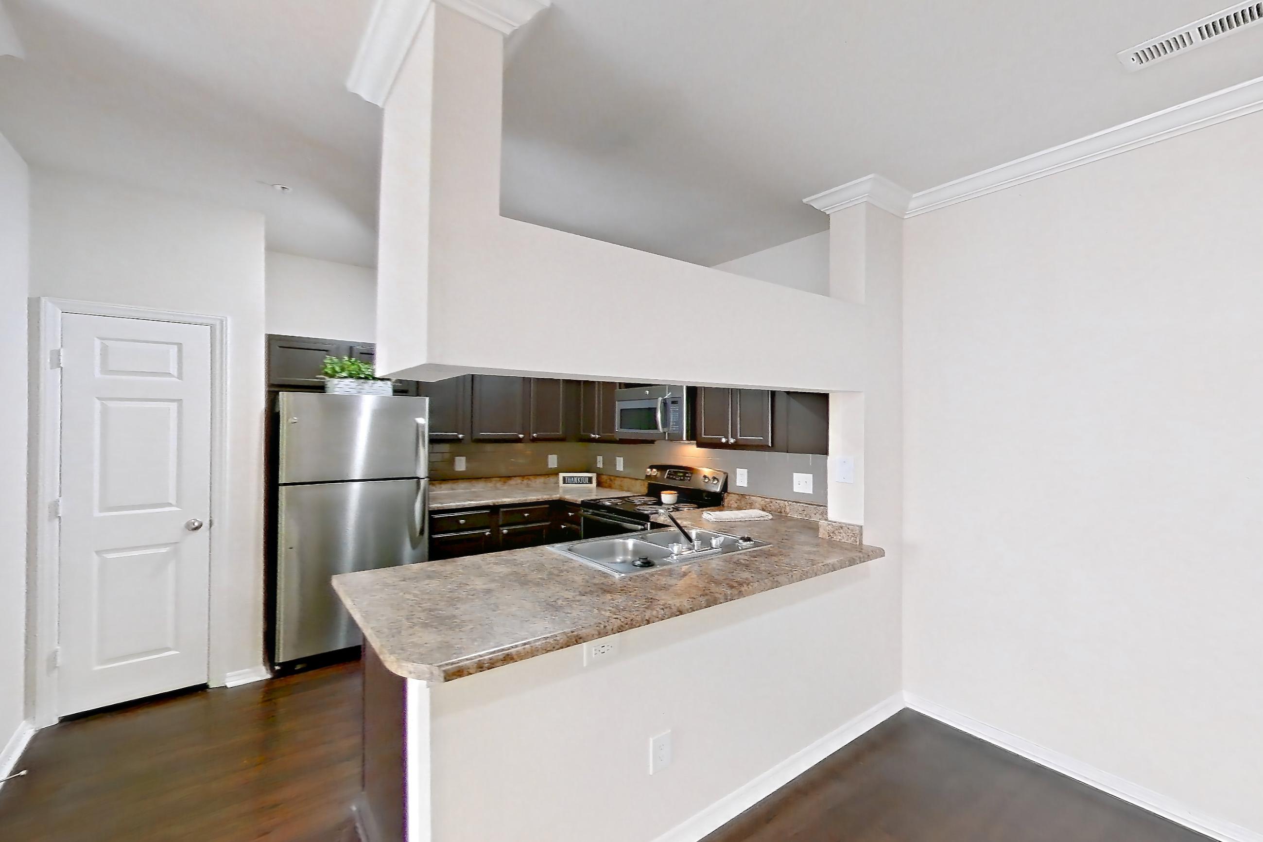 Dining room, Apartment 1122 at Marquis of Carmel Valley