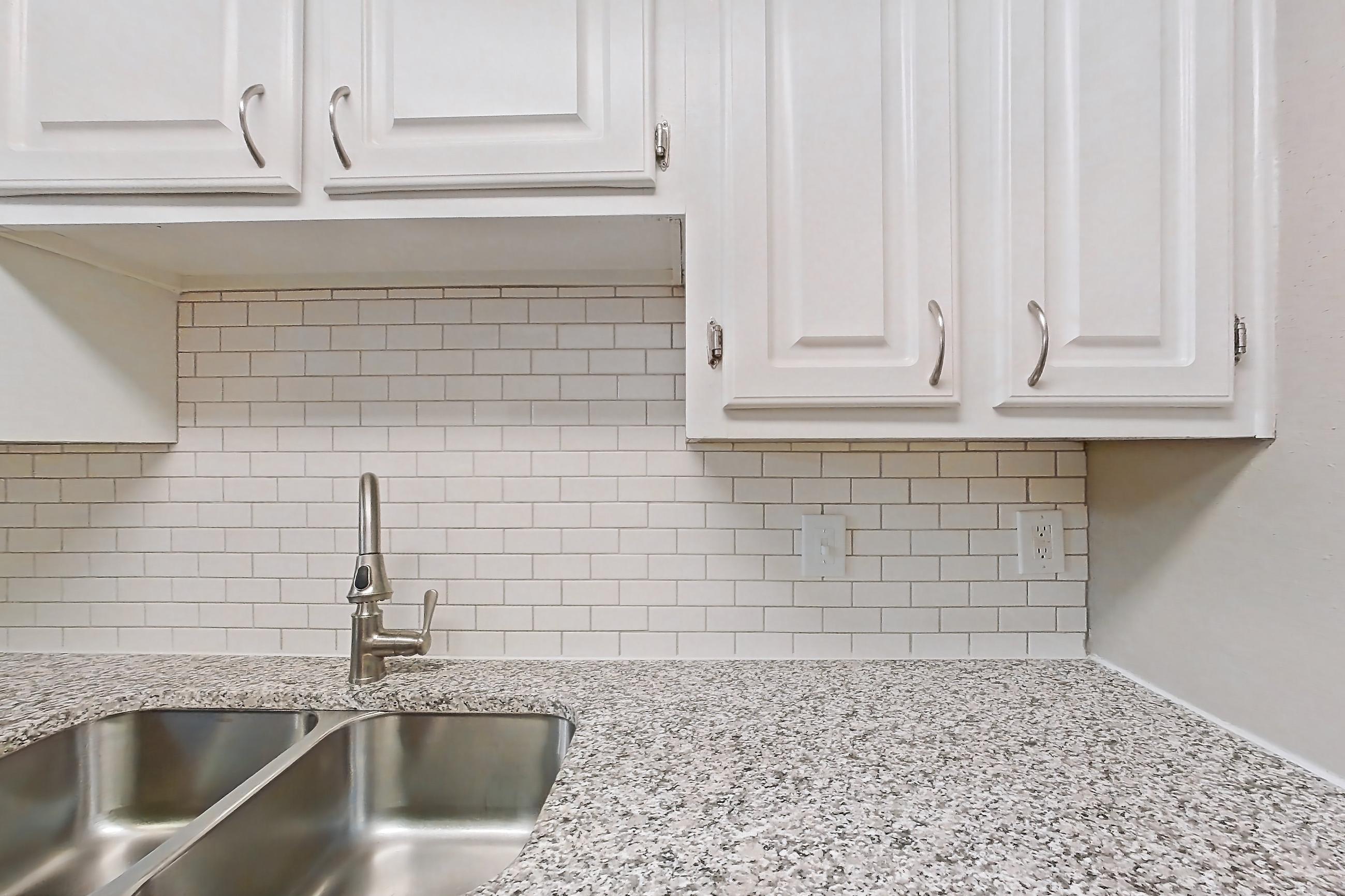 Kitchen in Apartment f224 at Austin Midtown, 1A floor plan