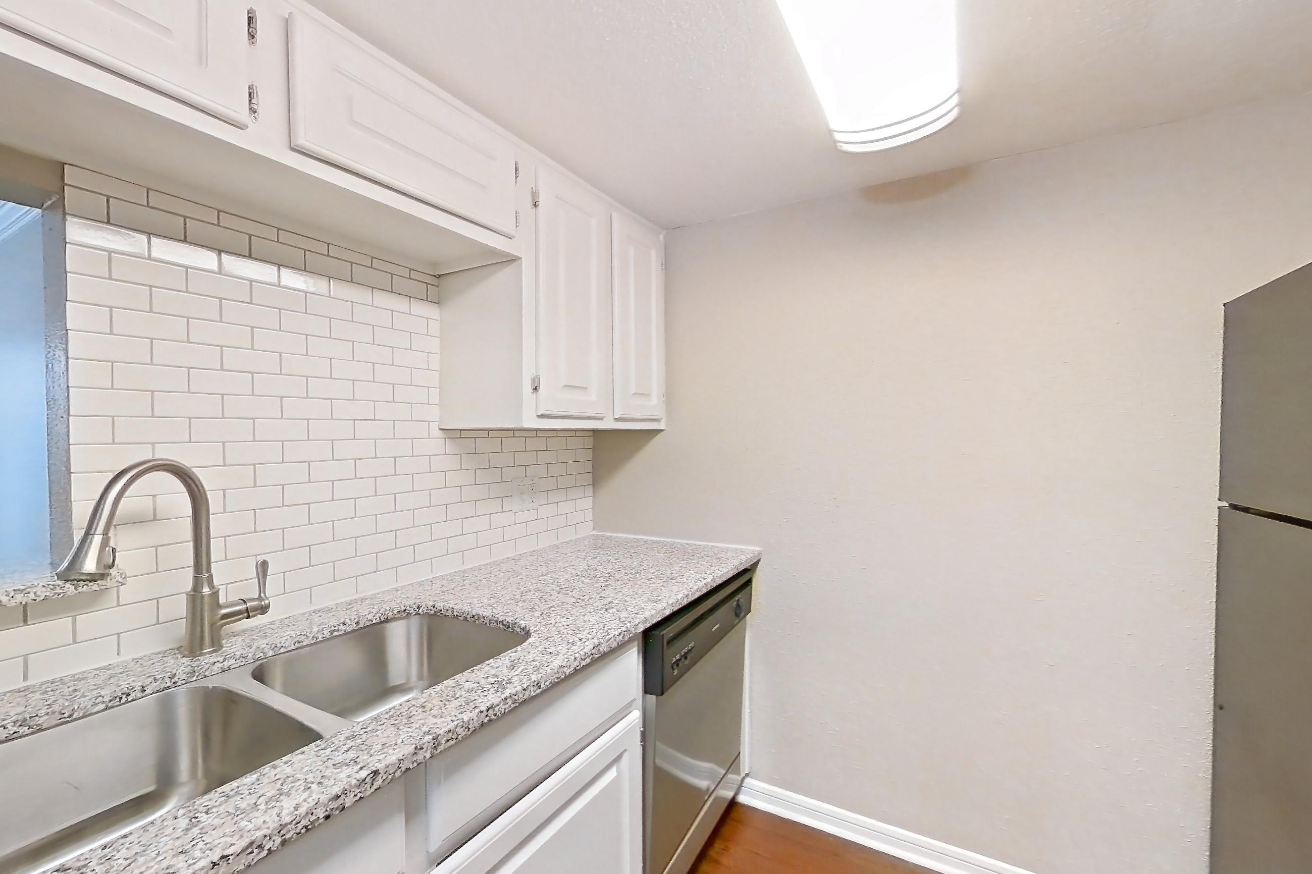 Kitchen in Apartment n138 at Austin Midtown, 2B floor plan