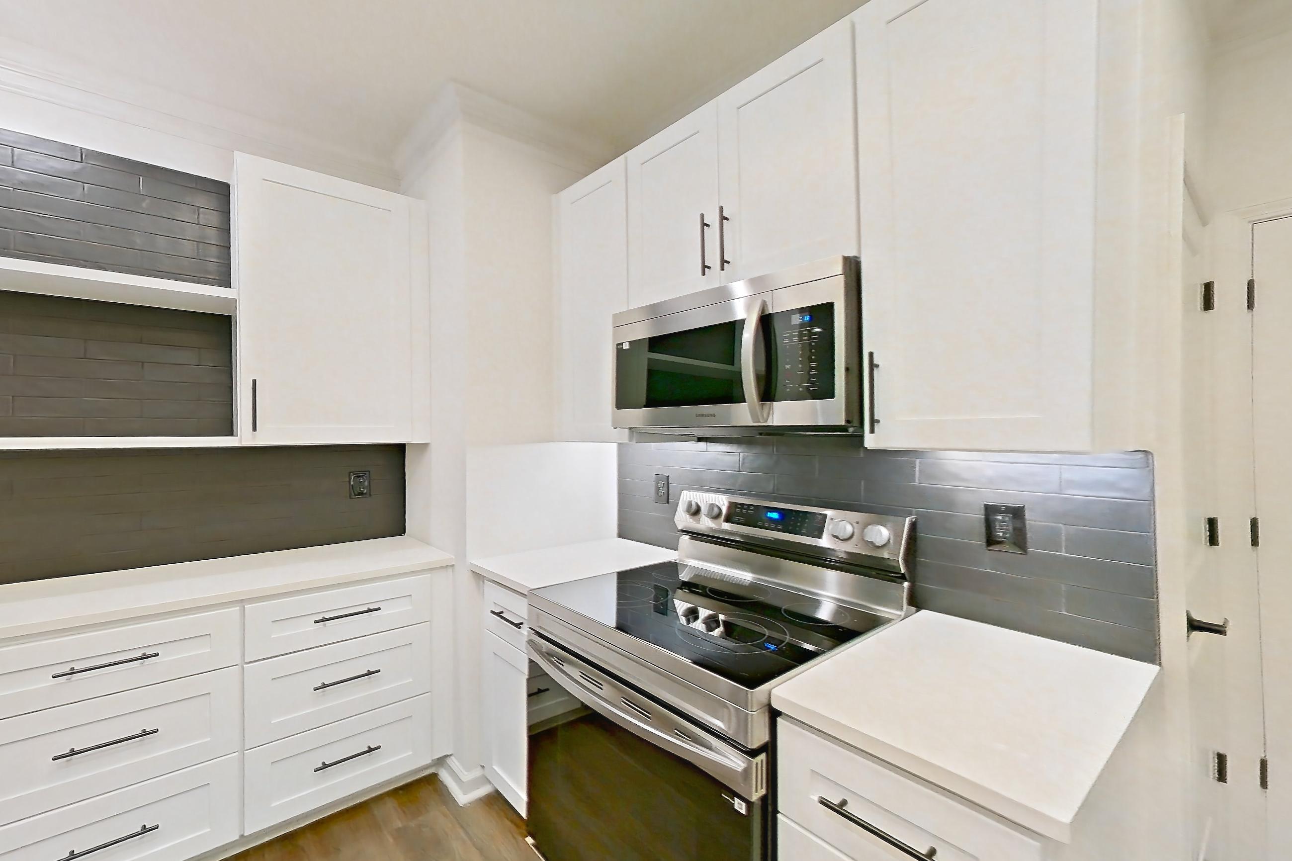 Kitchen in Apartment 12203 at Cortland at Armour Yards, B1R - Midtown floor plan