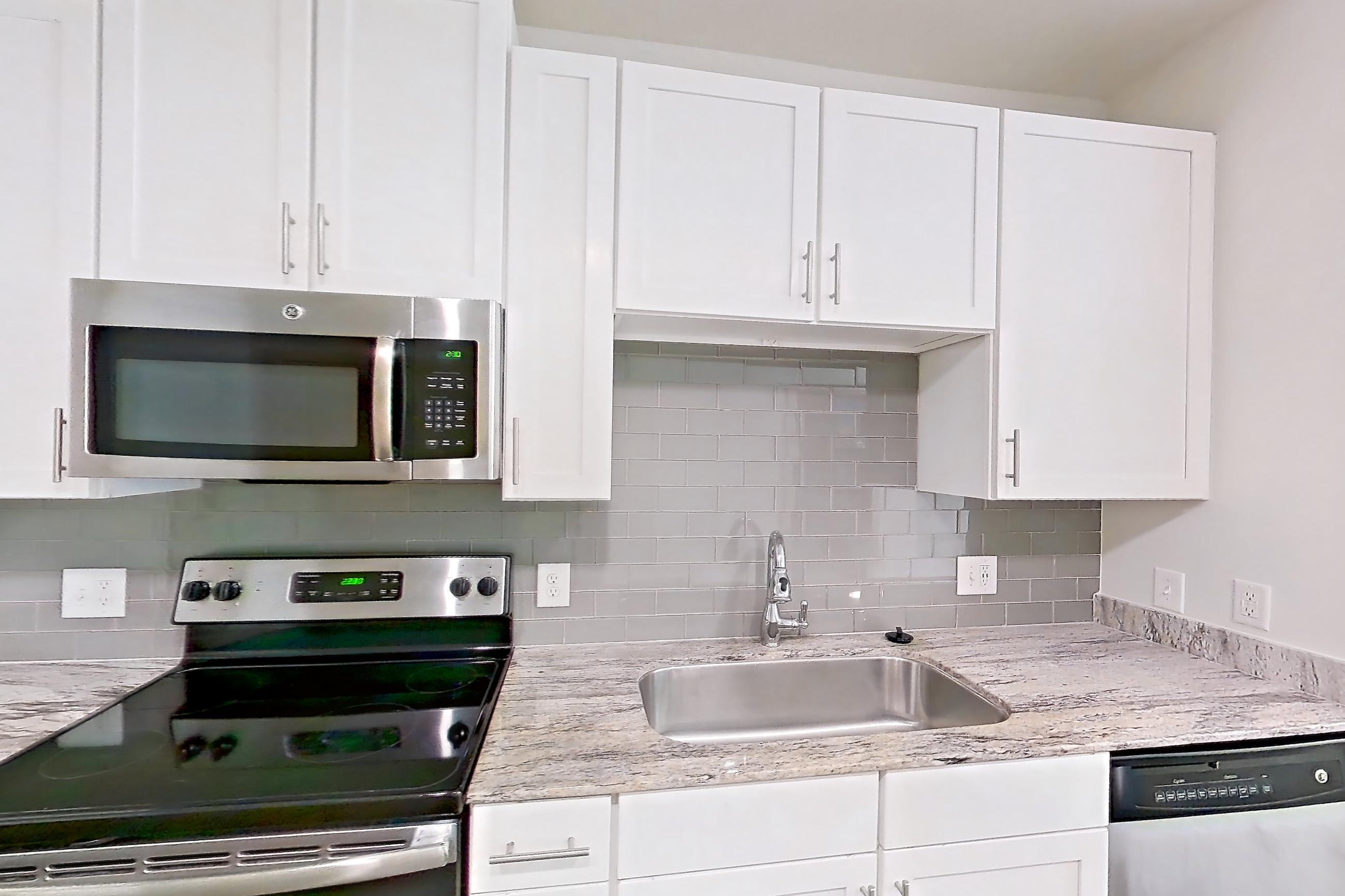 Kitchen in Apartment 1287 at Cortland at Phipps Plaza, A1 - Argonne floor plan