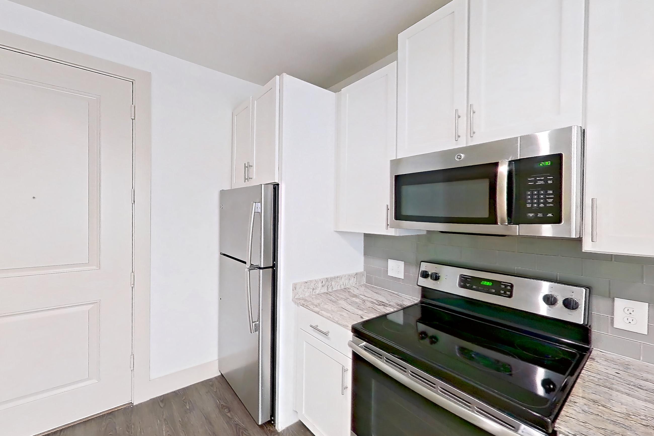 Kitchen in Apartment 1287 at Cortland at Phipps Plaza, A1 - Argonne floor plan