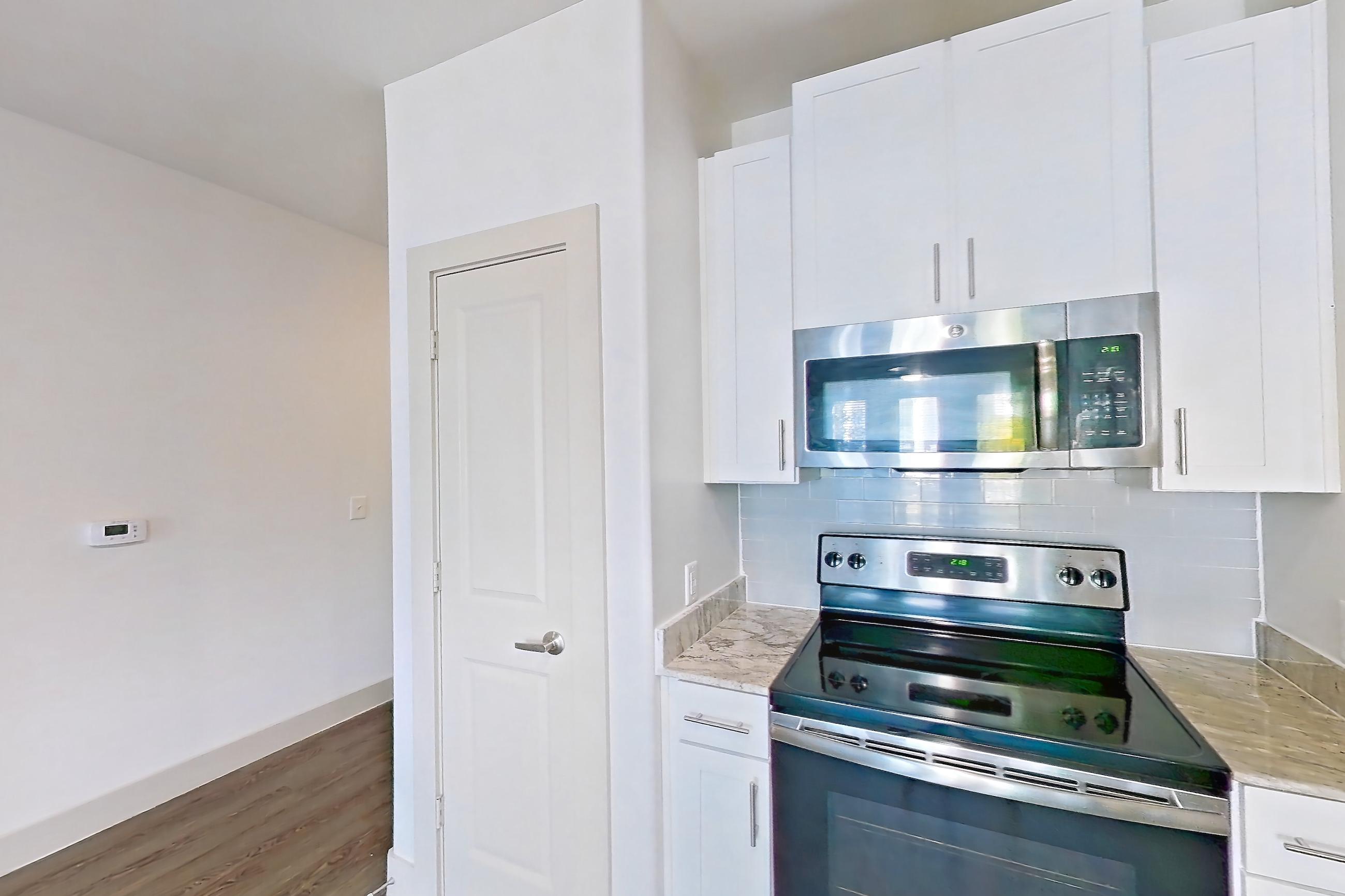 Kitchen in Apartment 1480 at Cortland at Phipps Plaza, A9 - Garden Hills floor plan