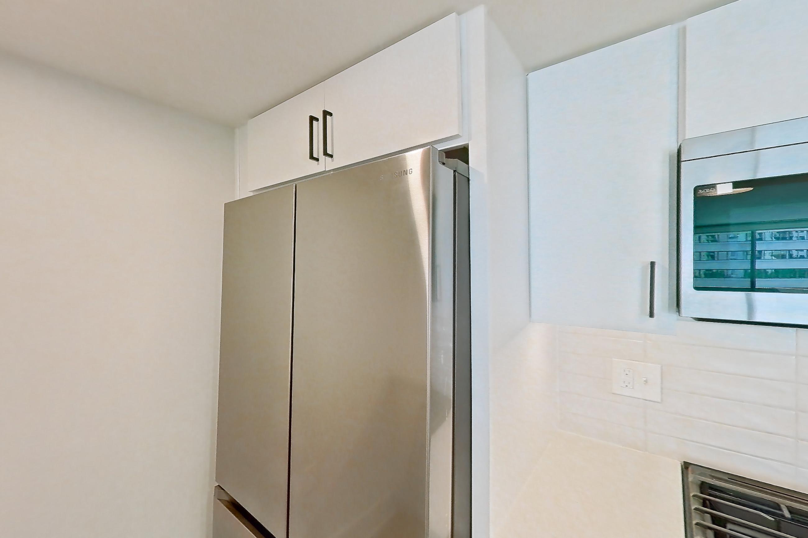 Kitchen in Apartment 02-0606 at Cortland Pentagon City, A4R floor plan