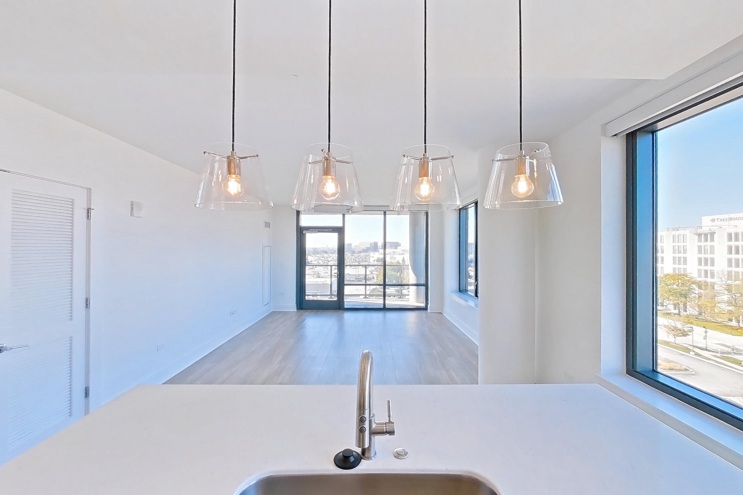 Kitchen in Apartment 719 at One Oak Brook Commons, E2 floor plan