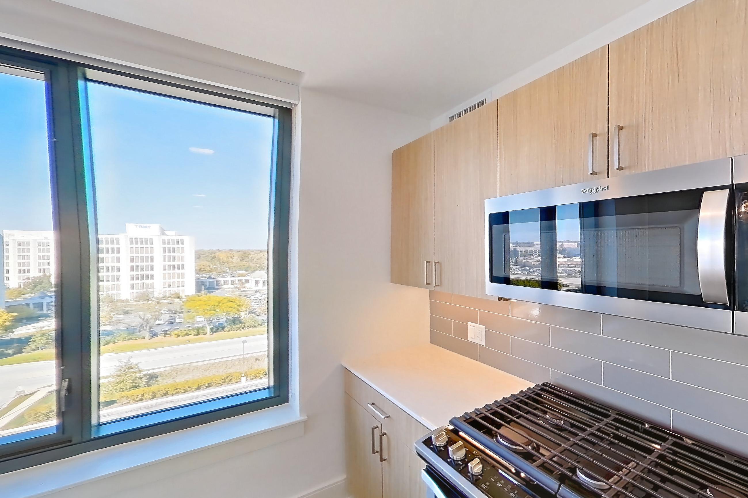 Kitchen in Apartment 719 at One Oak Brook Commons, E2 floor plan