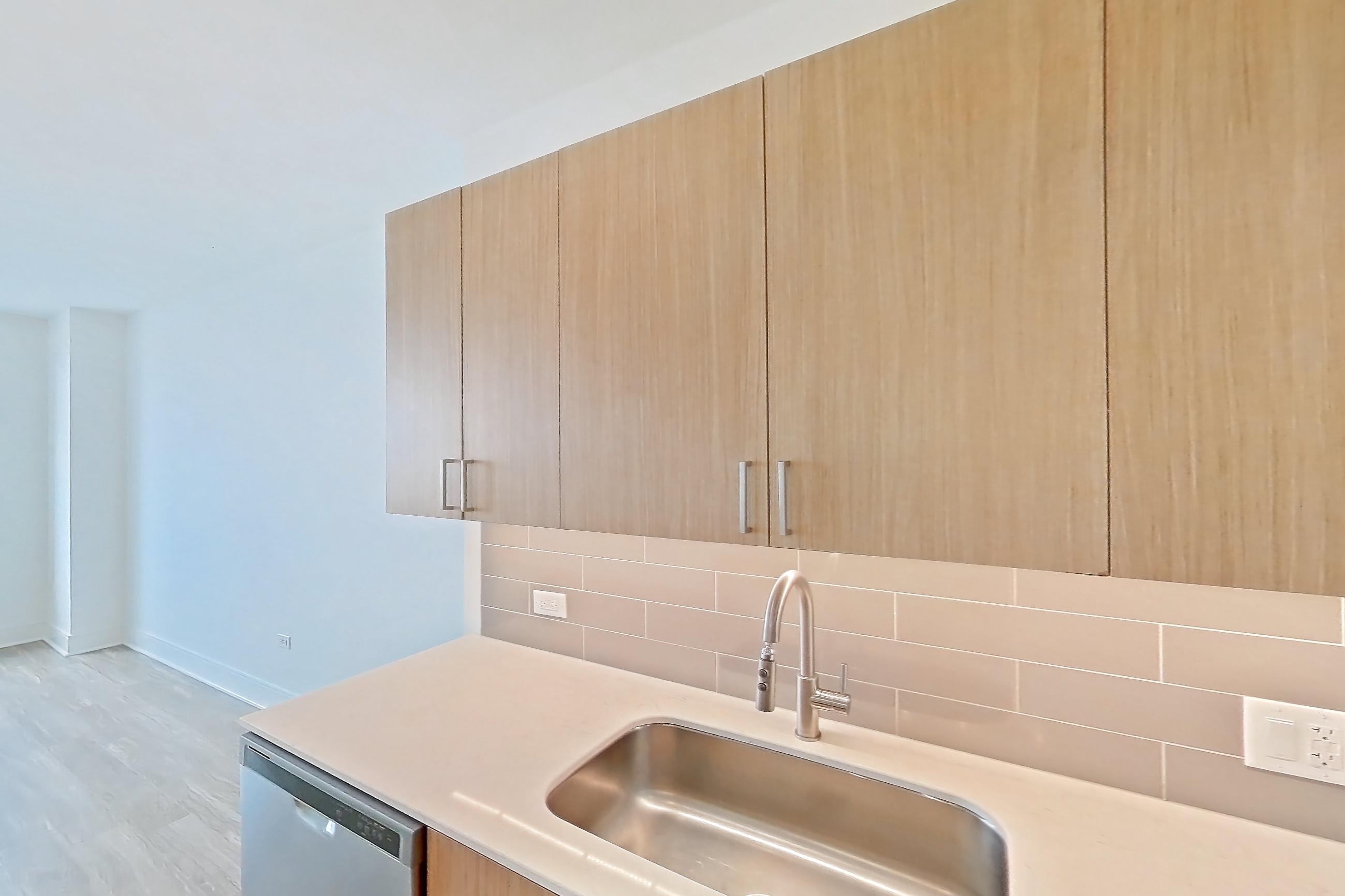 Kitchen in Apartment 1215 at One Oak Brook Commons, F1.2 floor plan