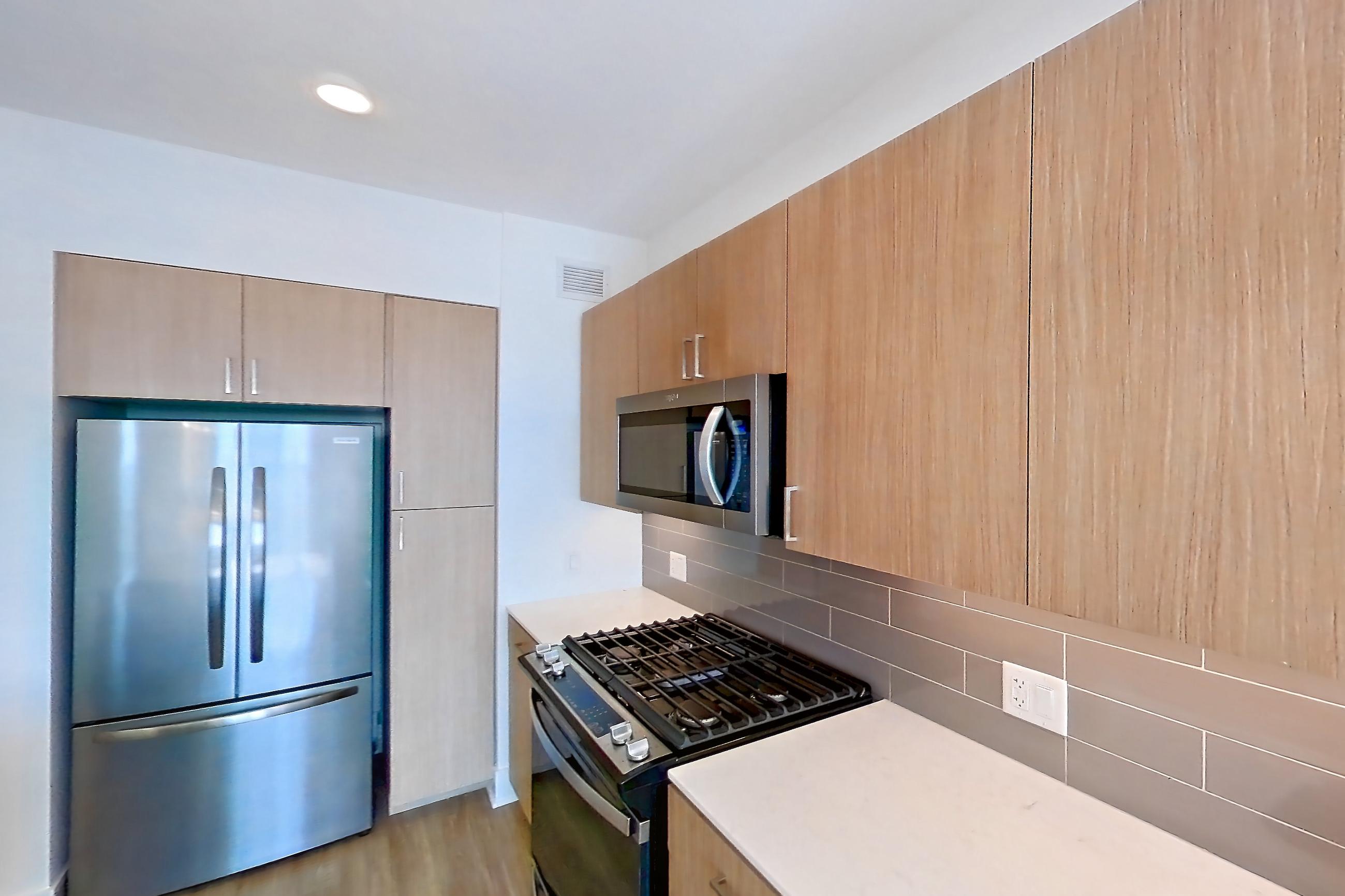 Kitchen in Apartment 1216 at One Oak Brook Commons, A1.2 floor plan