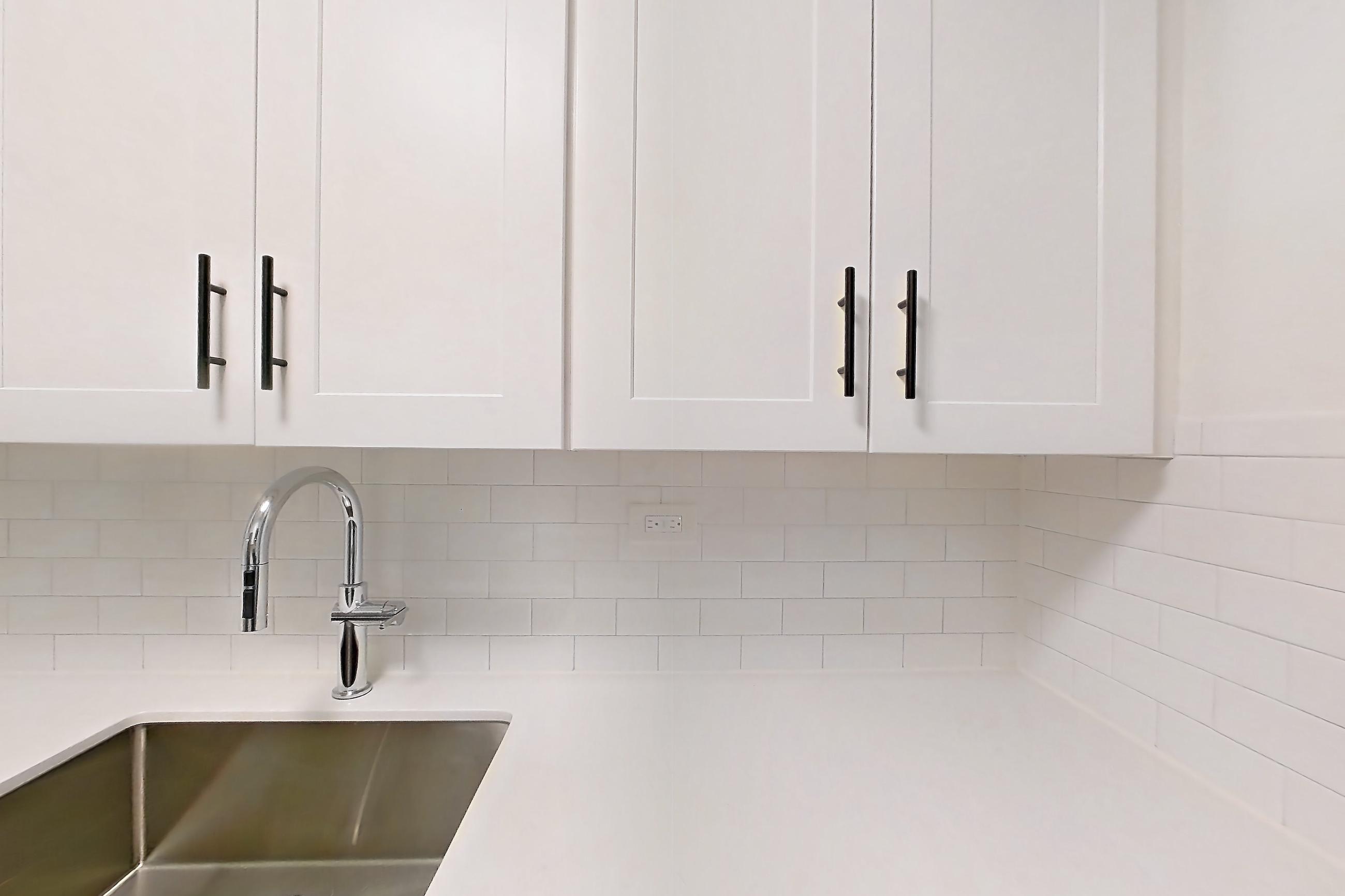 Kitchen in Apartment 30-08b at Waterside Plaza, 1H floor plan